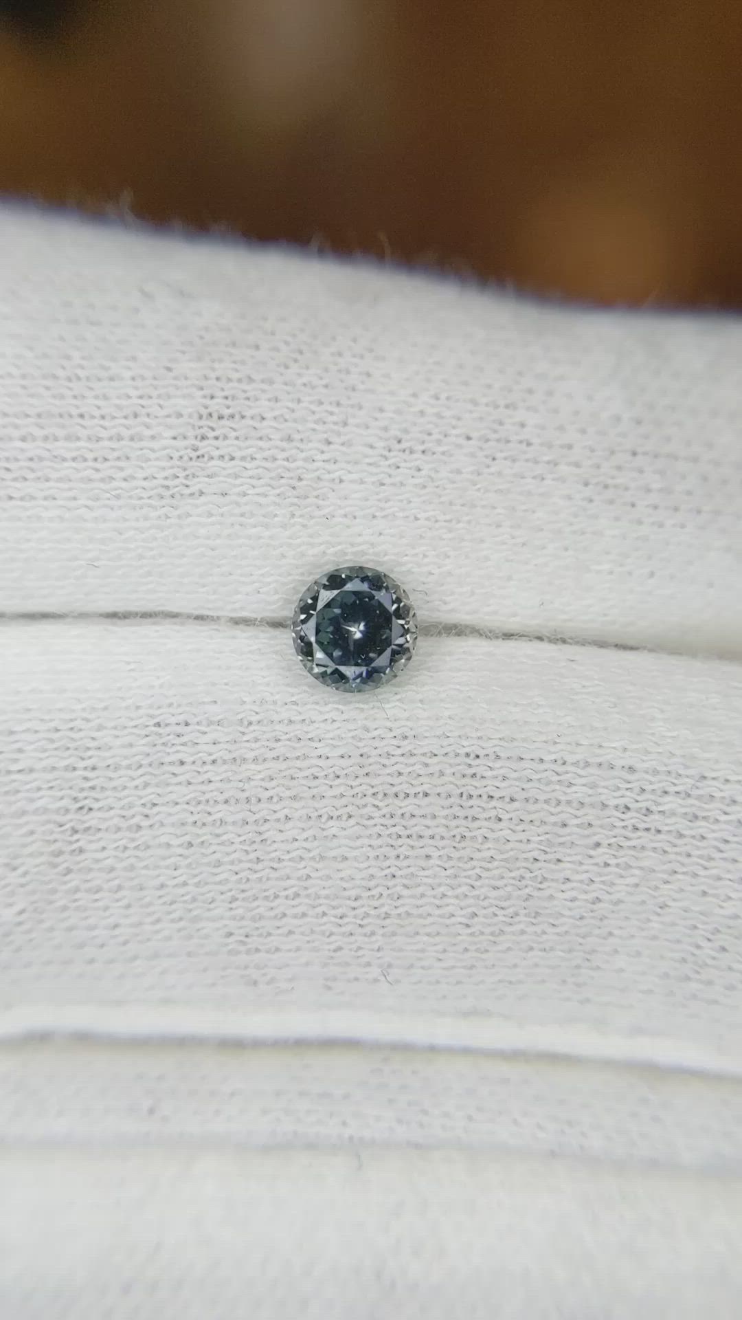 0.66 Ct. Greyish Blue Sapphire from Montana Size Video