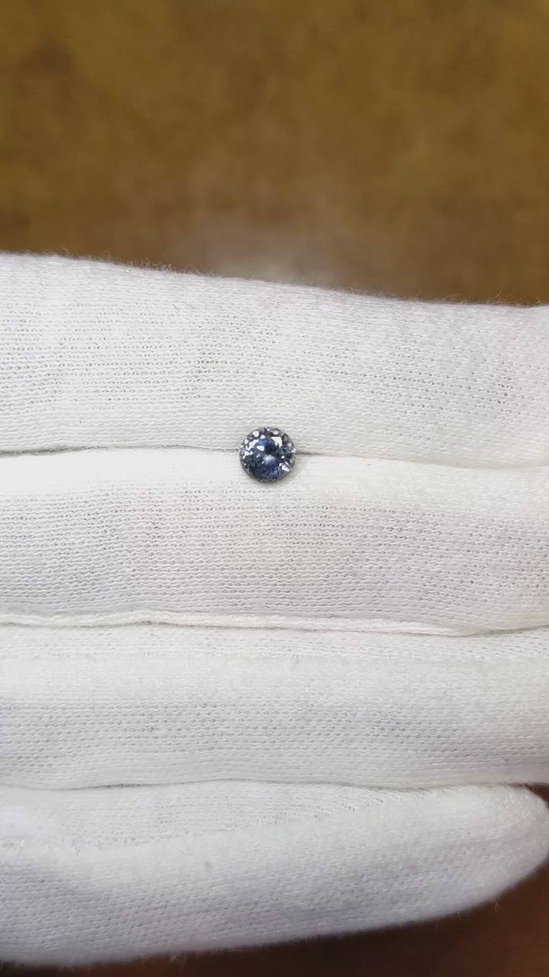 0.66 Ct. Greyish Blue Sapphire from Montana Size Video