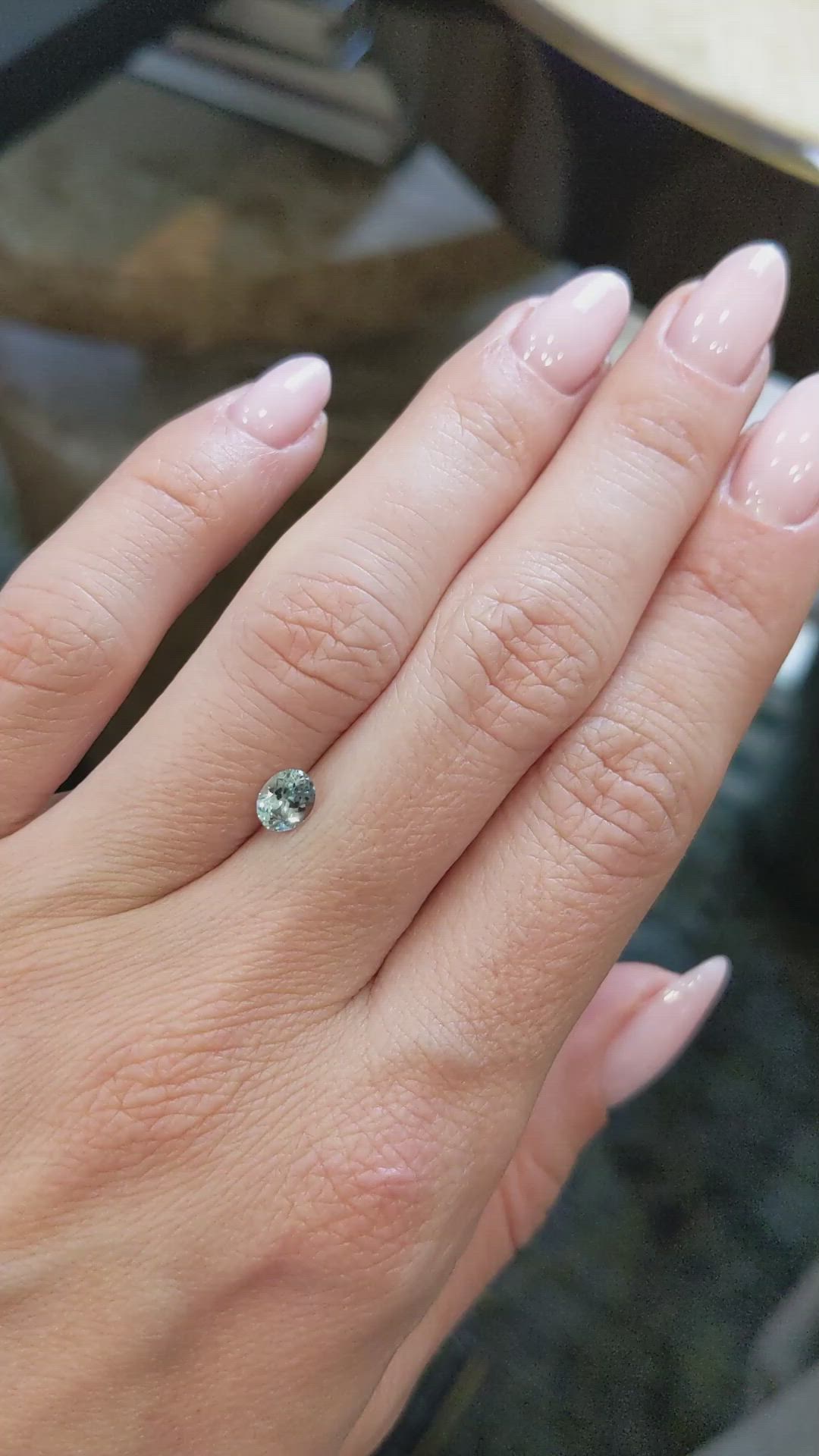 0.58 Ct. Bluish Green Sapphire from Montana Size Video