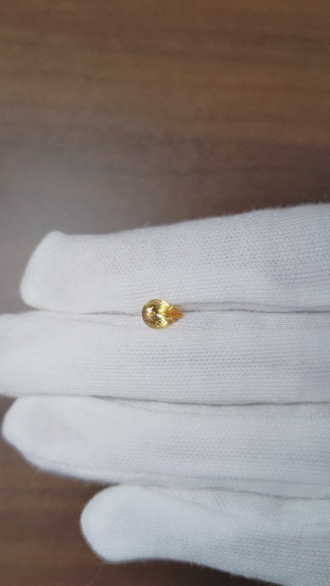 0.86 Ct. Orangish Yellow Sapphire from Ceylon (Sri Lanka) Size Video