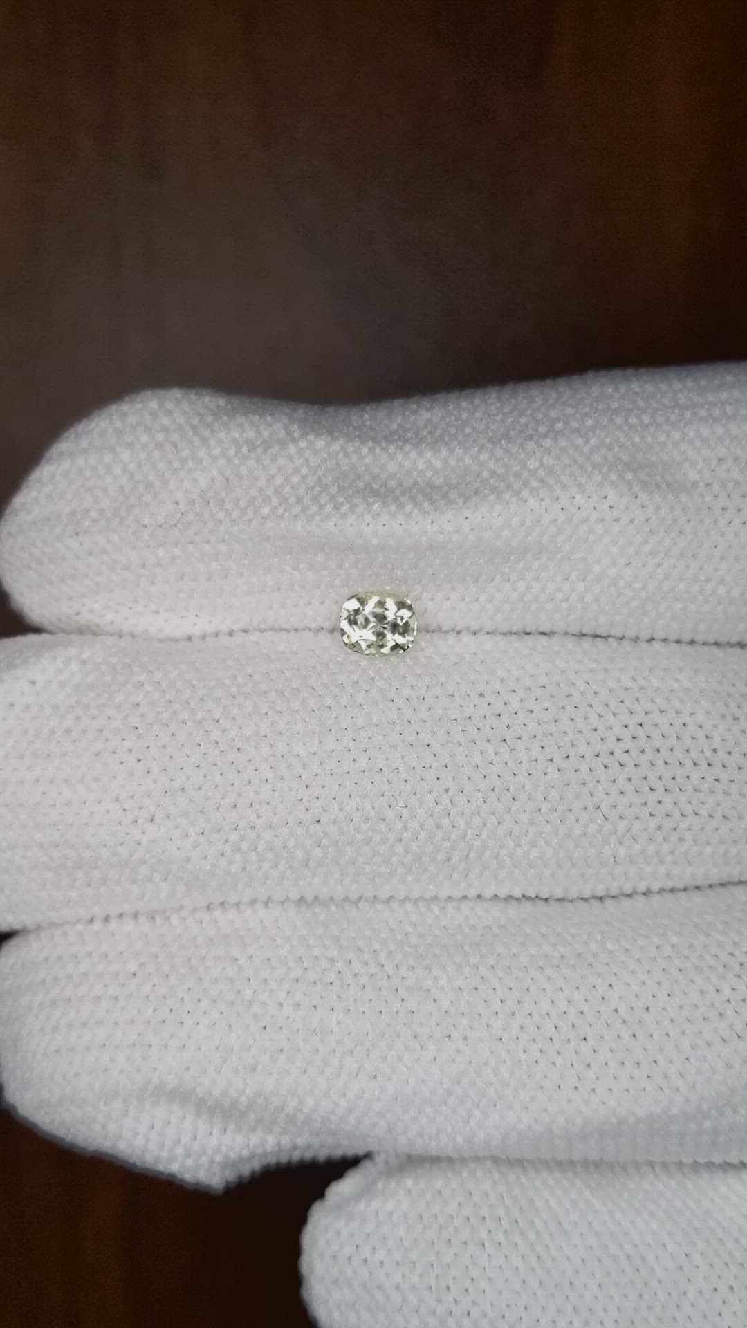 0.50 Ct. Yellowish Green Sapphire from Montana Size Video