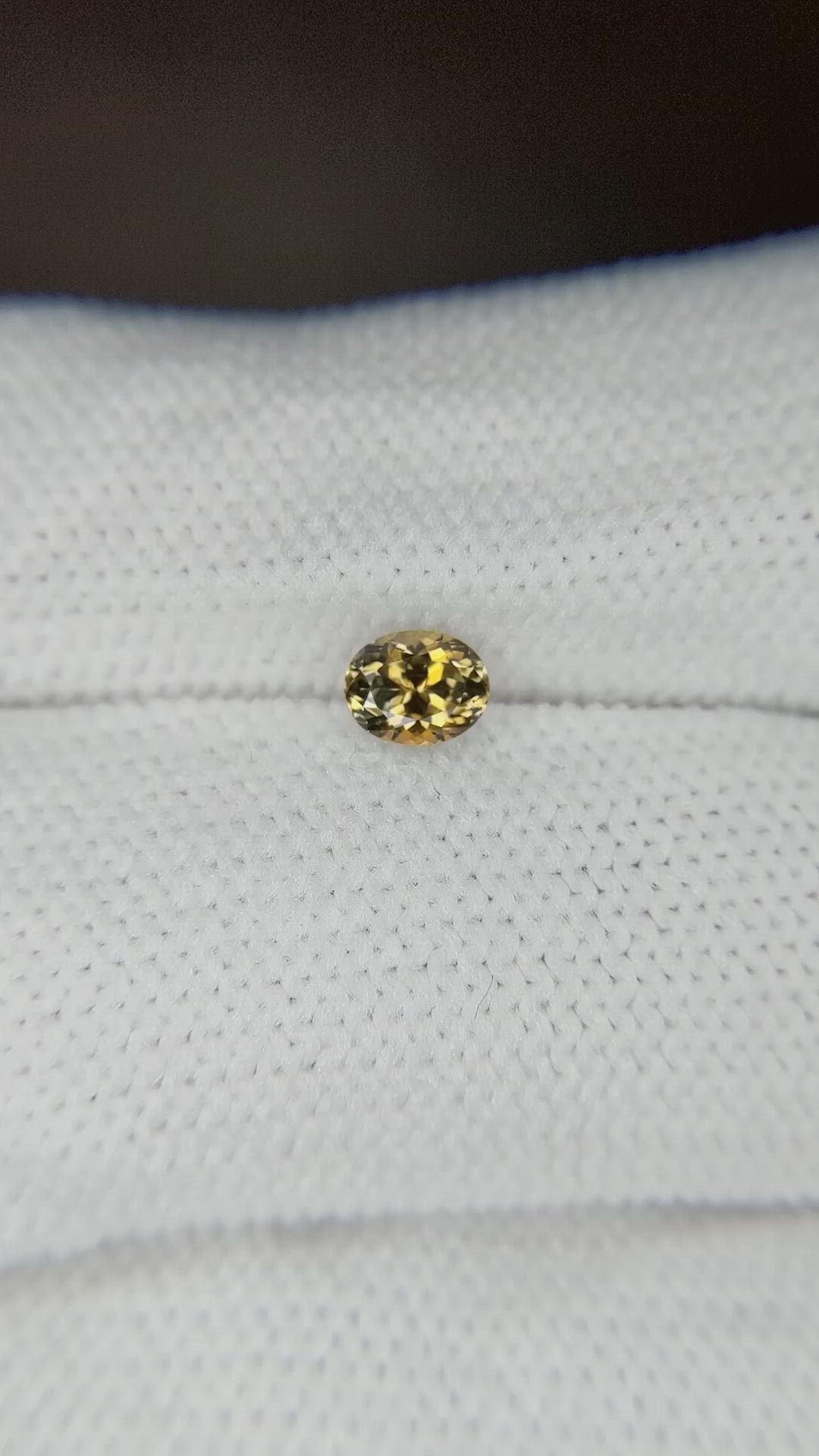 0.51 Ct. Yellowish Brown Sapphire from Montana Size Video