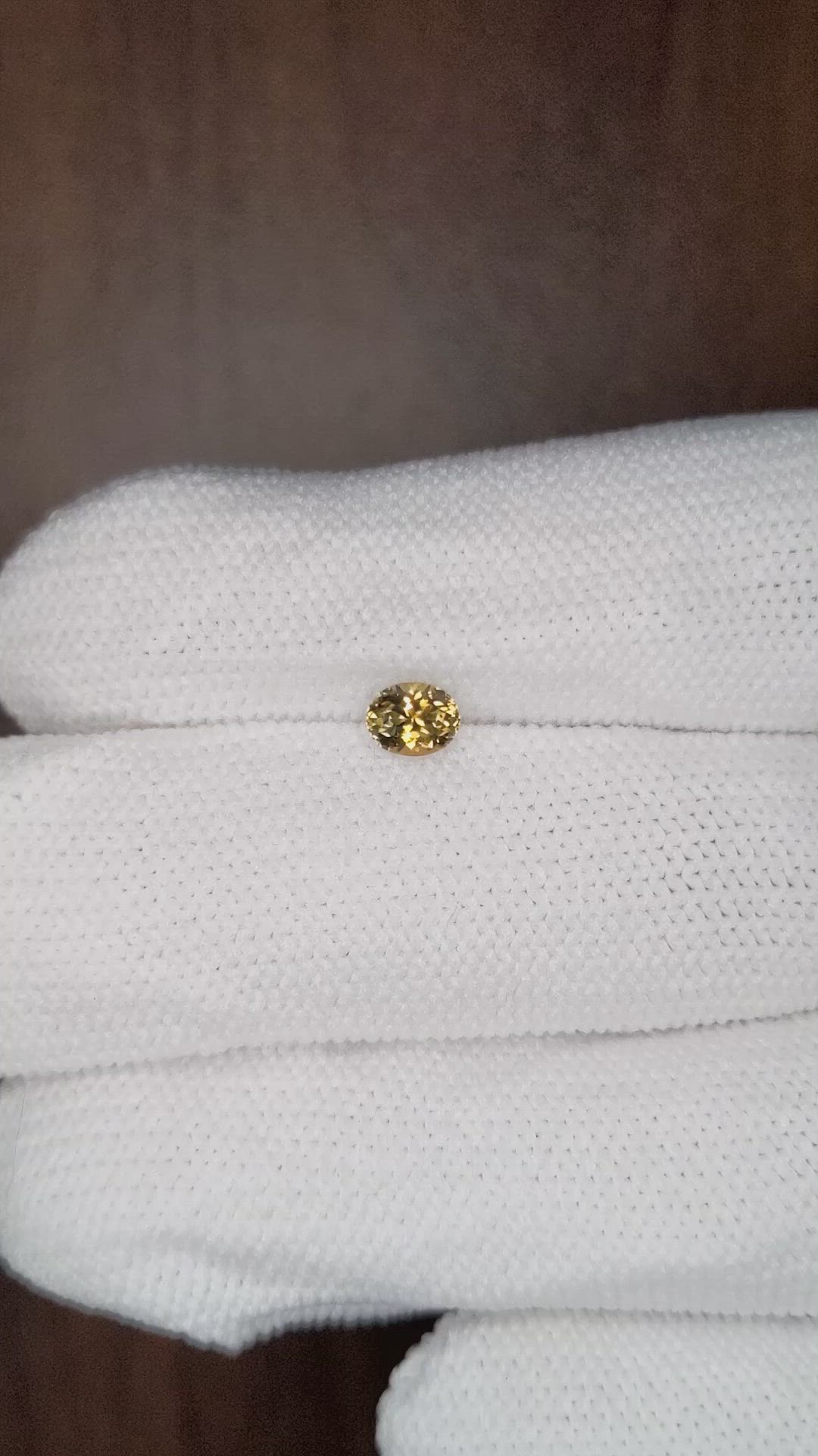 0.51 Ct. Yellowish Brown Sapphire from Montana Size Video