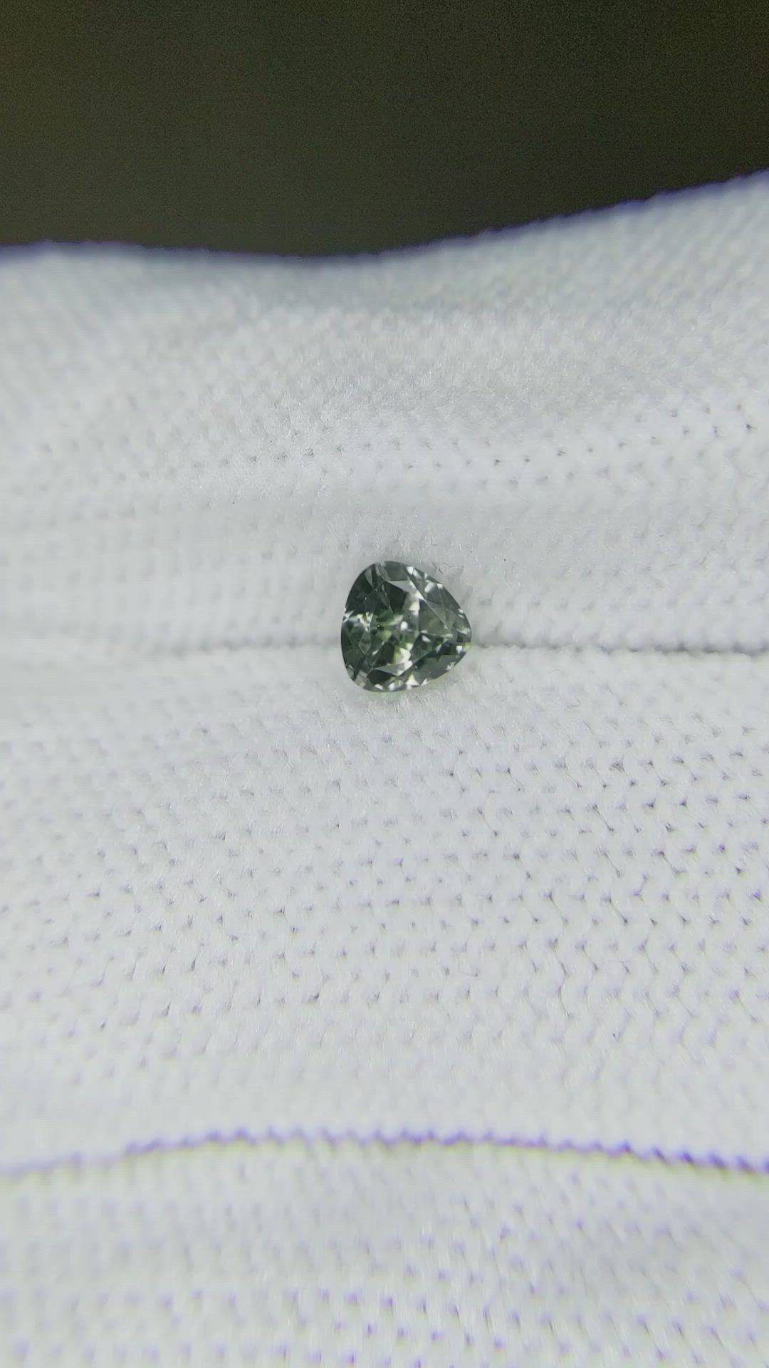 0.52 Ct. Greenish Brown Sapphire from Montana Size Video