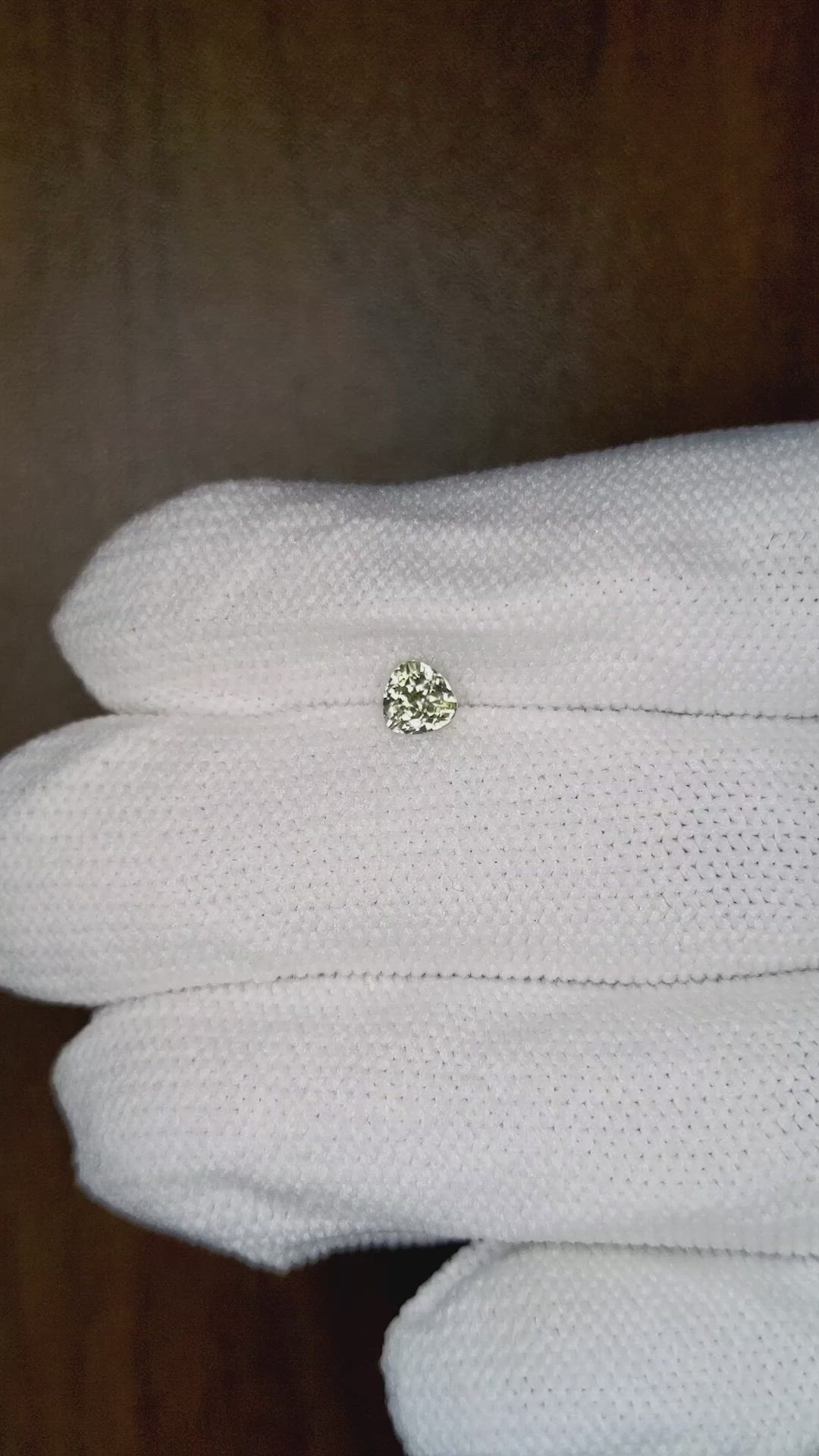 0.52 Ct. Greenish Brown Sapphire from Montana Size Video