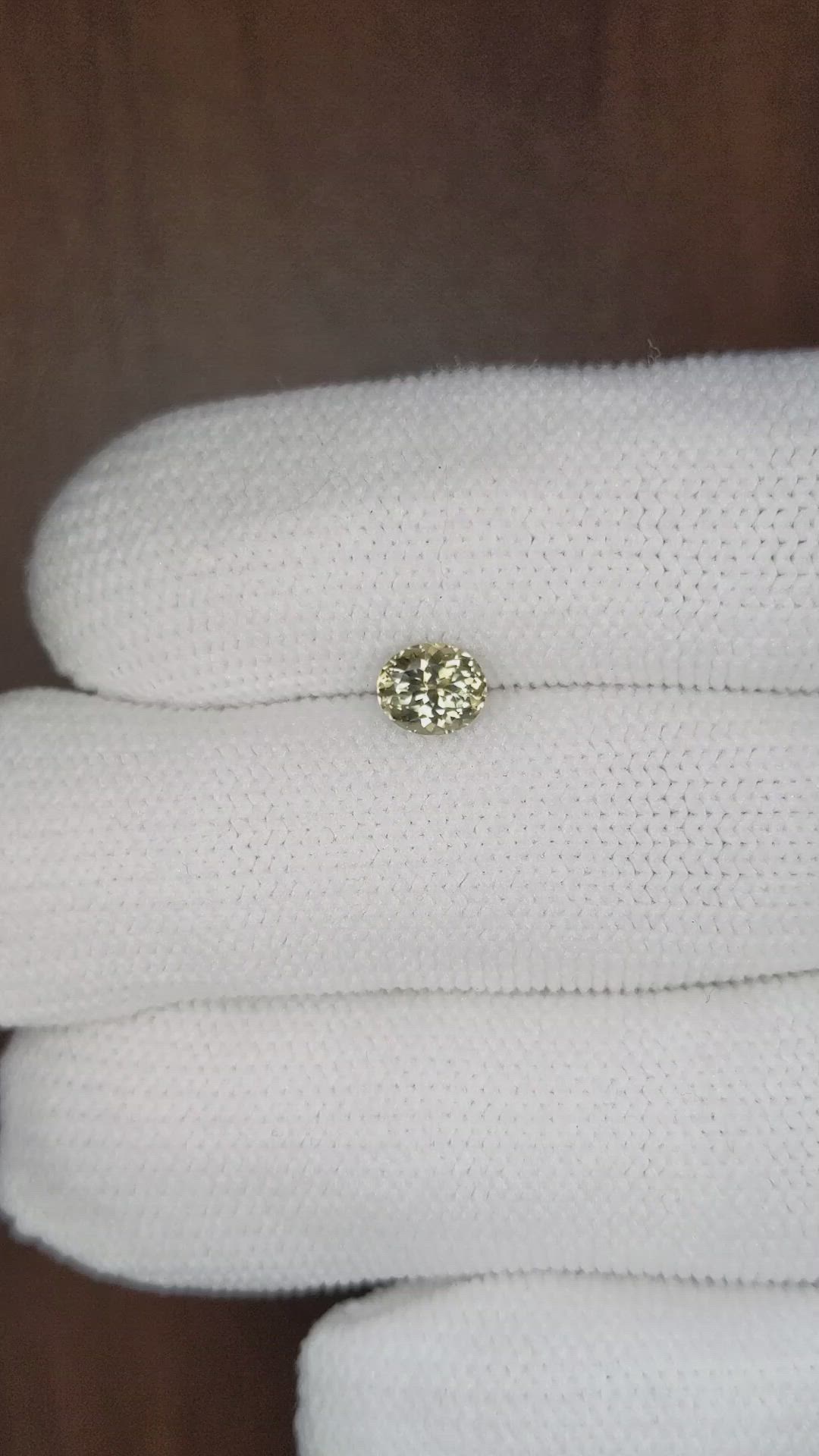 0.95 Ct. Greenish Yellow Sapphire from Montana Size Video