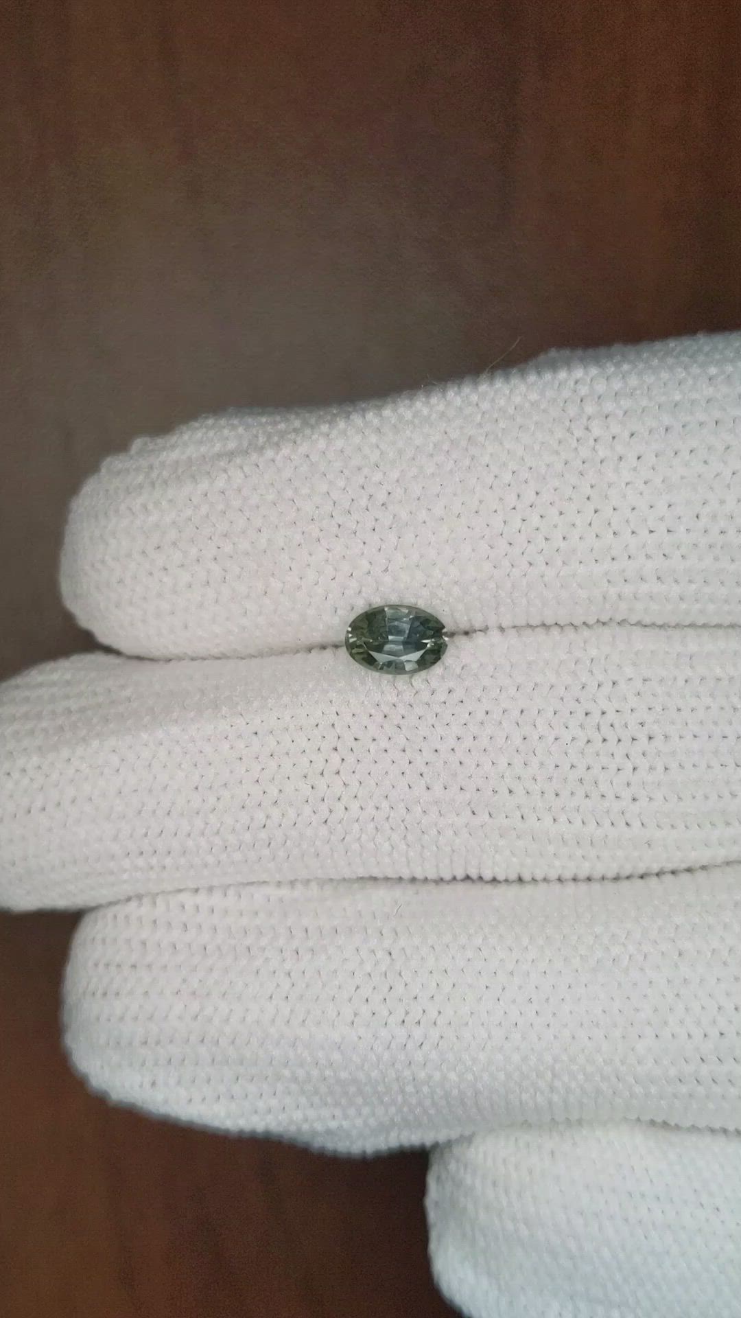 0.78 Ct. Bluish Green Sapphire from Montana Size Video