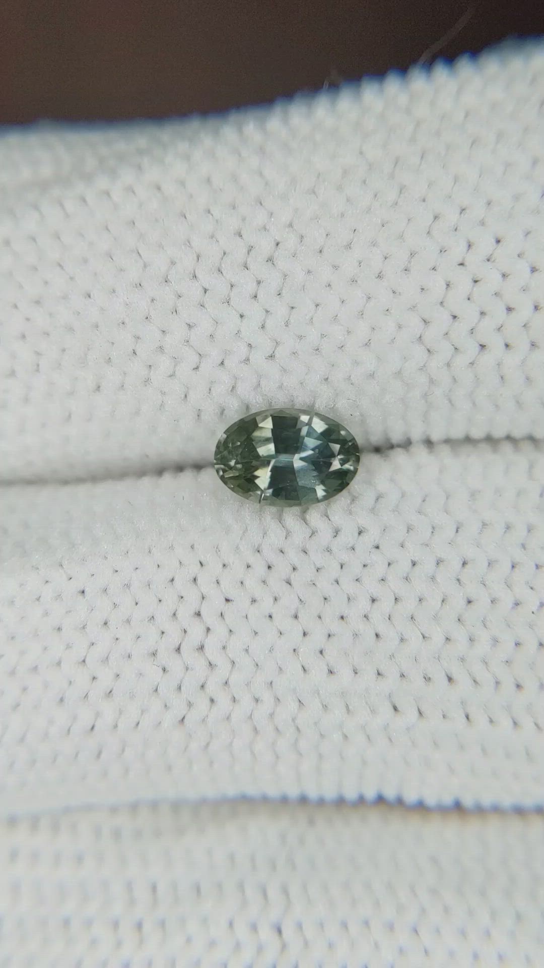 0.78 Ct. Bluish Green Sapphire from Montana Size Video