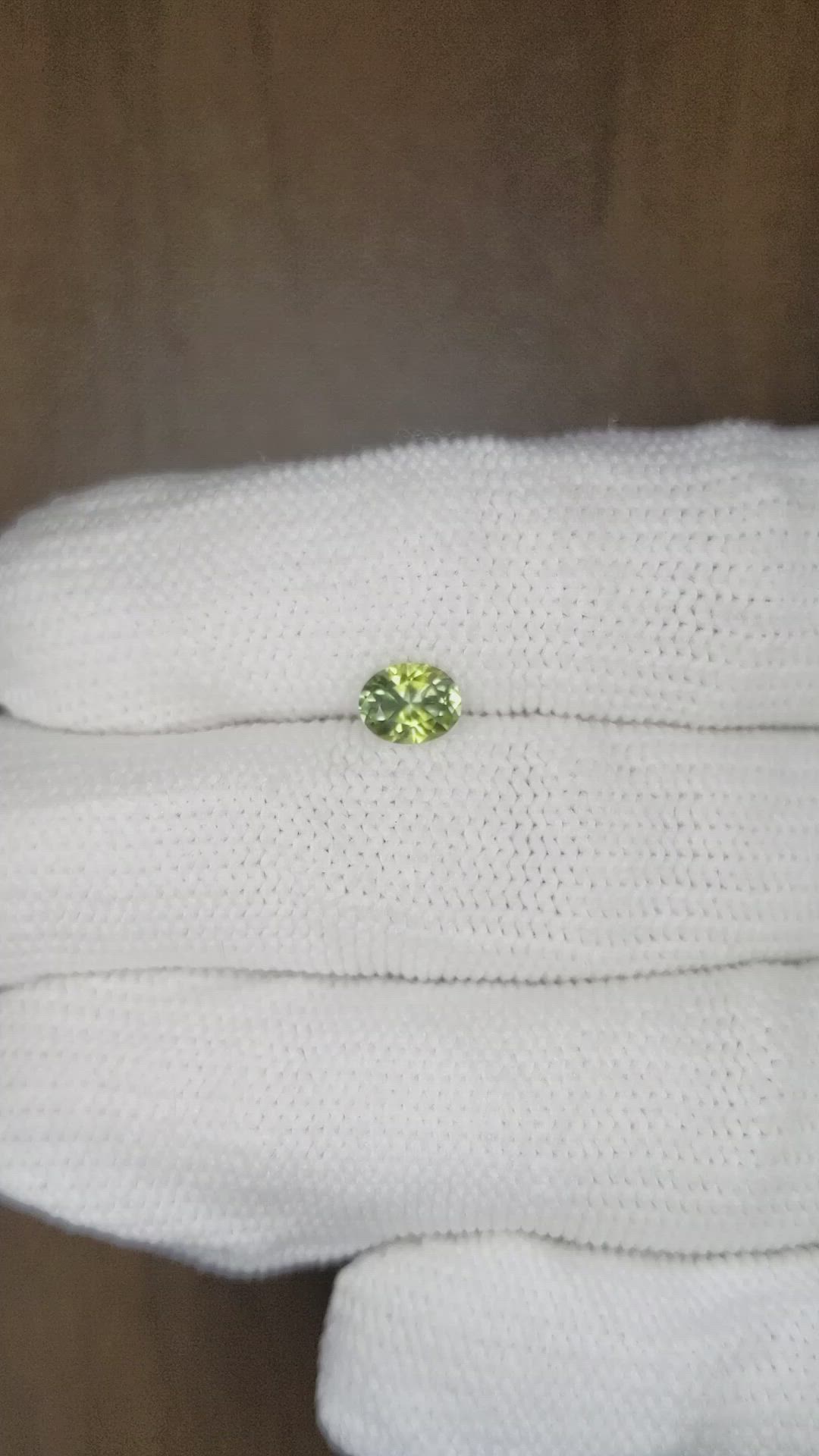 0.77 Ct. Yellowish Green Sapphire from Montana Size Video
