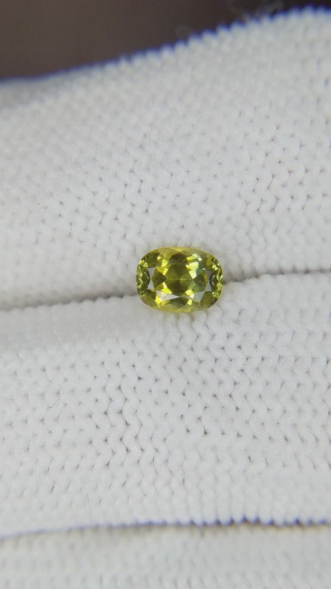 0.64 Ct. Yellowish Green Sapphire from Montana Size Video