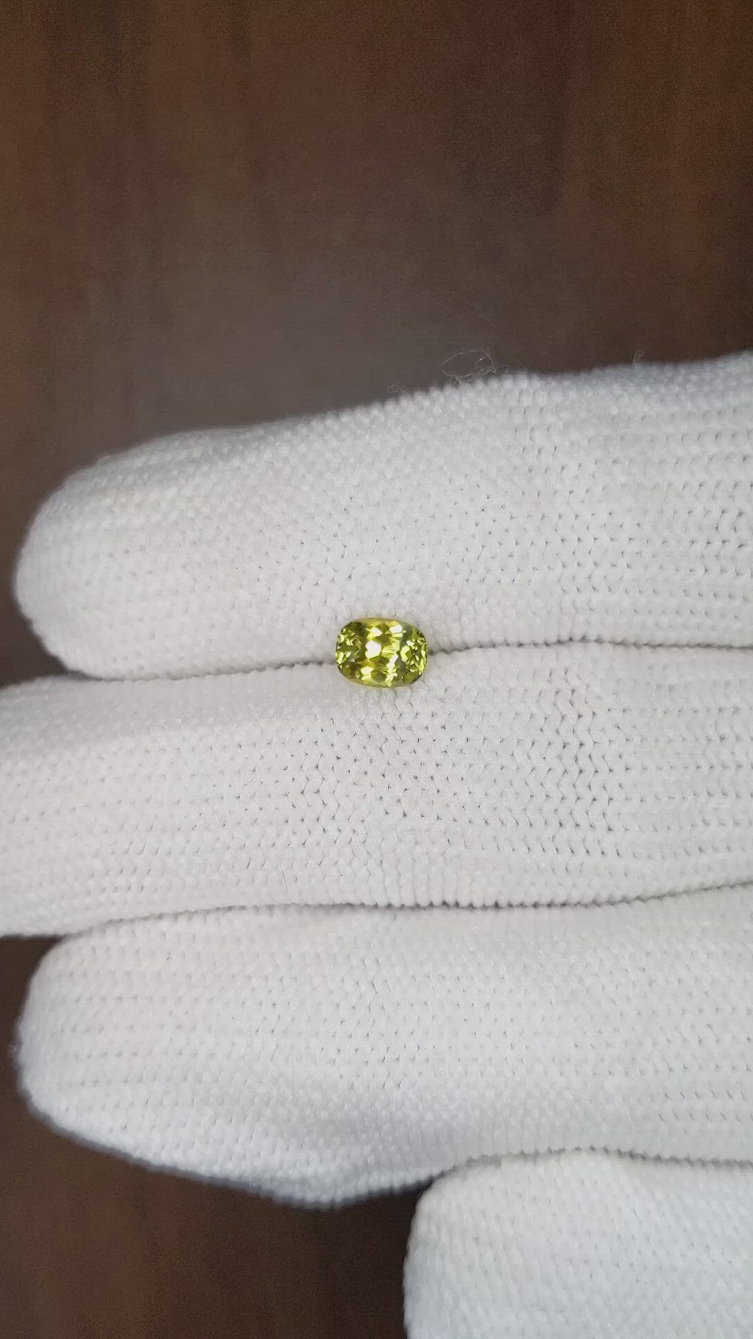 0.64 Ct. Yellowish Green Sapphire from Montana Size Video
