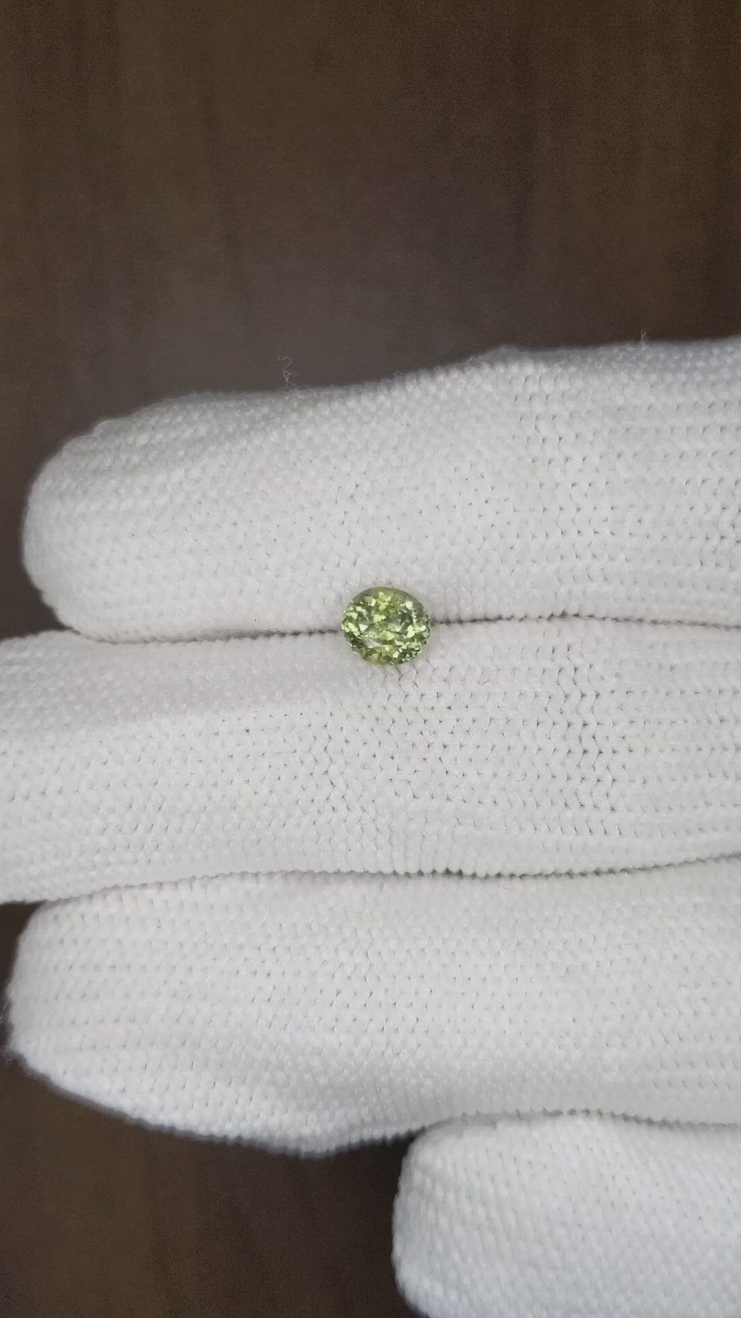 0.72 Ct. Yellowish Green Sapphire from Montana Size Video