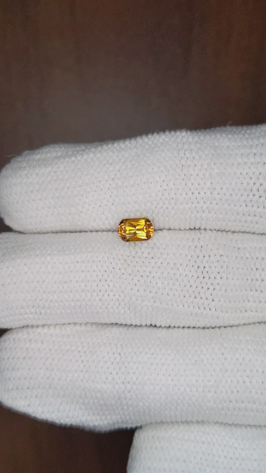 0.59 Ct. Orange Sapphire from Montana Size Video