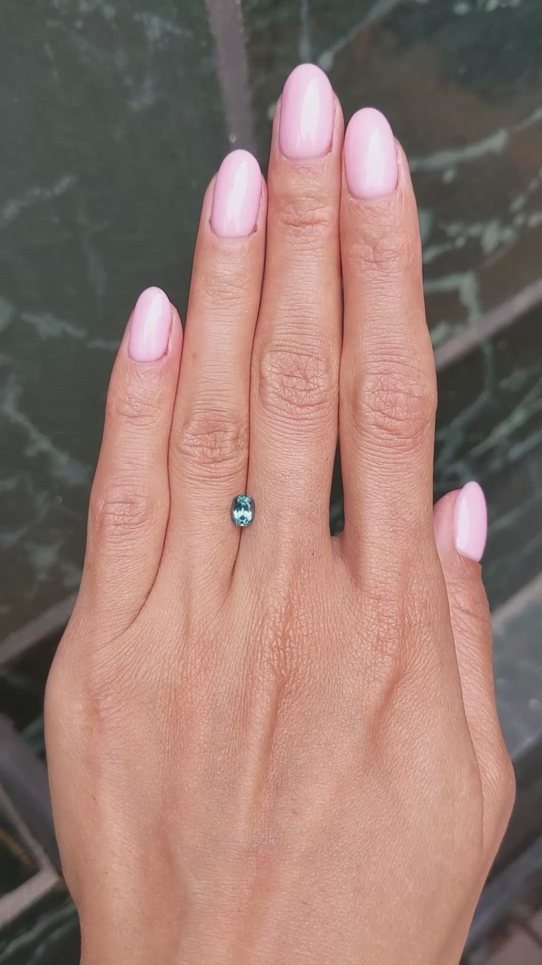 0.66 Ct. Bluish Green Sapphire from Montana Size Video