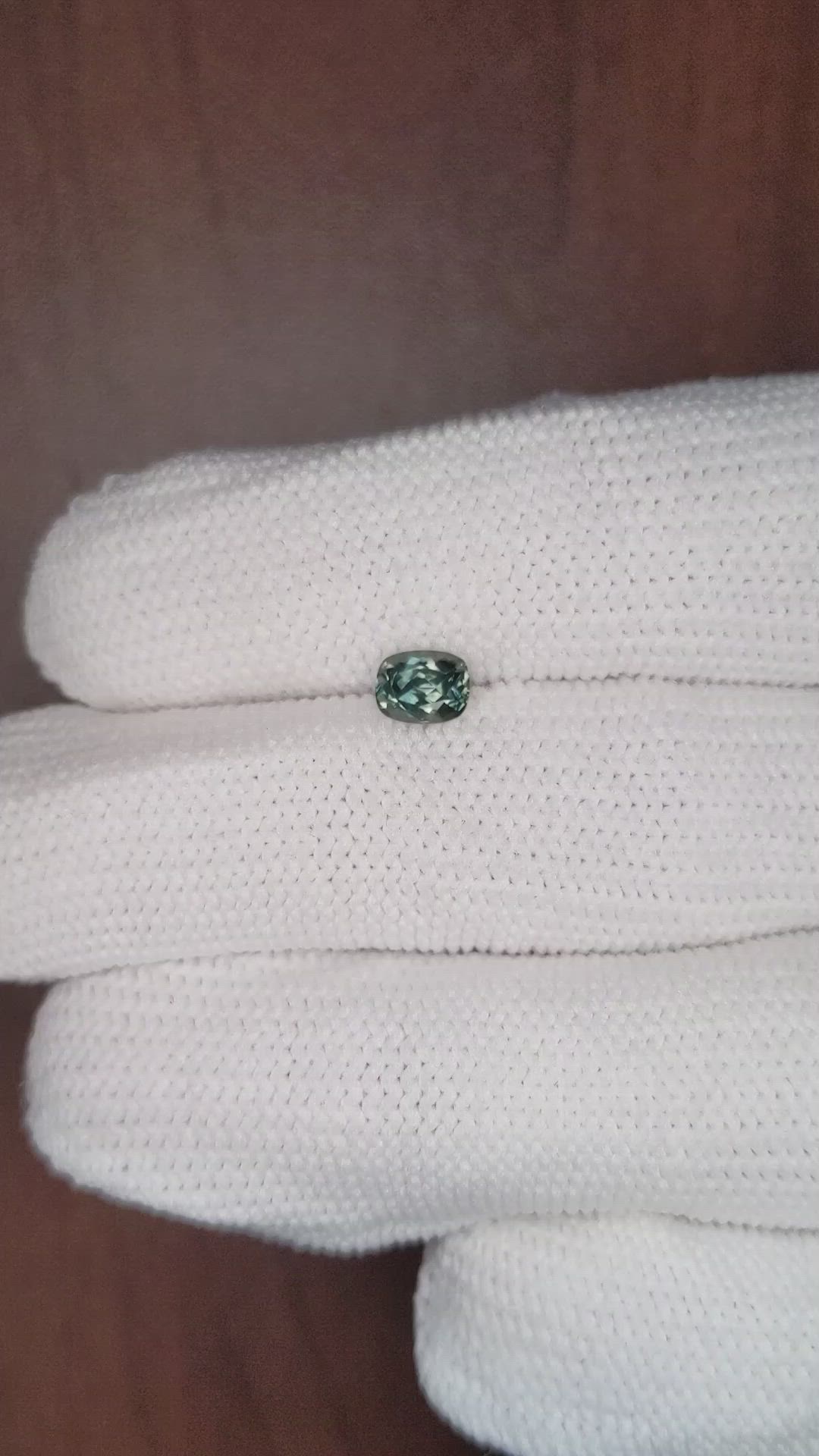 0.66 Ct. Bluish Green Sapphire from Montana Size Video