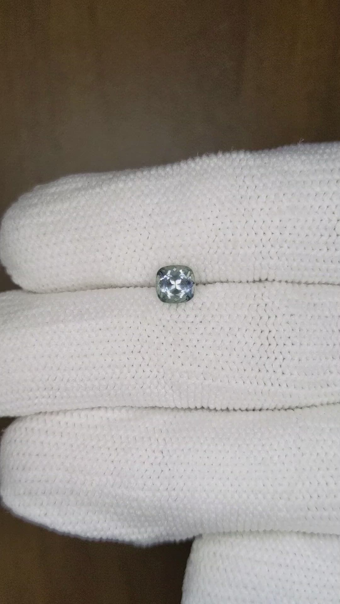 0.68 Ct. Bluish Green Sapphire from Montana Size Video