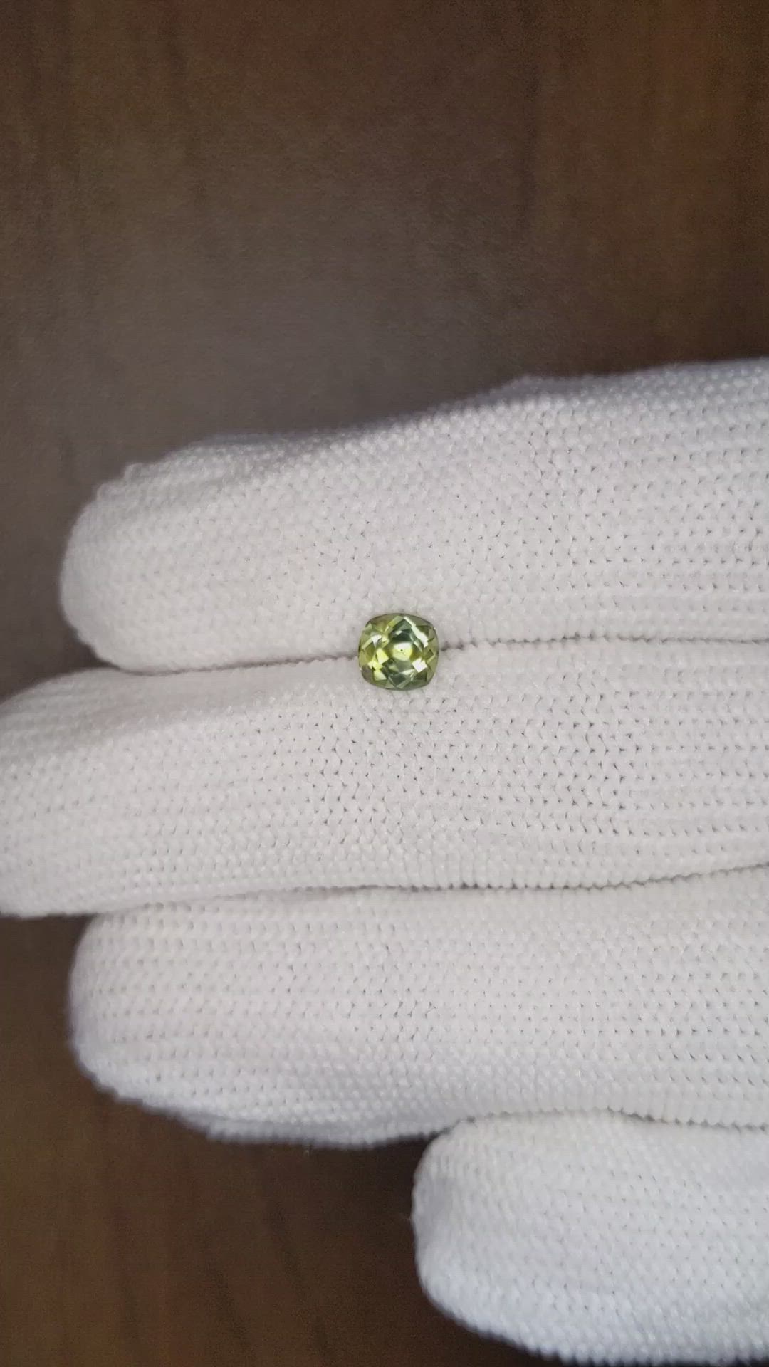 0.79 Ct. Yellowish Green Sapphire from Montana Size Video
