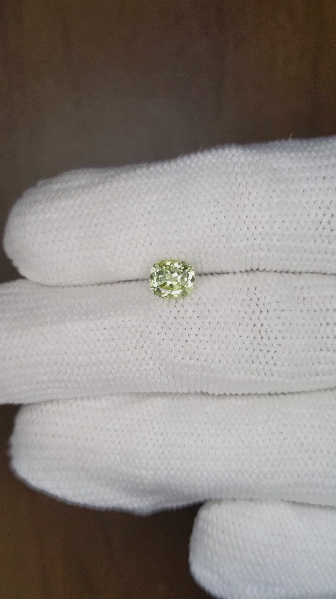 0.92 Ct. Yellowish Green Sapphire from Montana Size Video