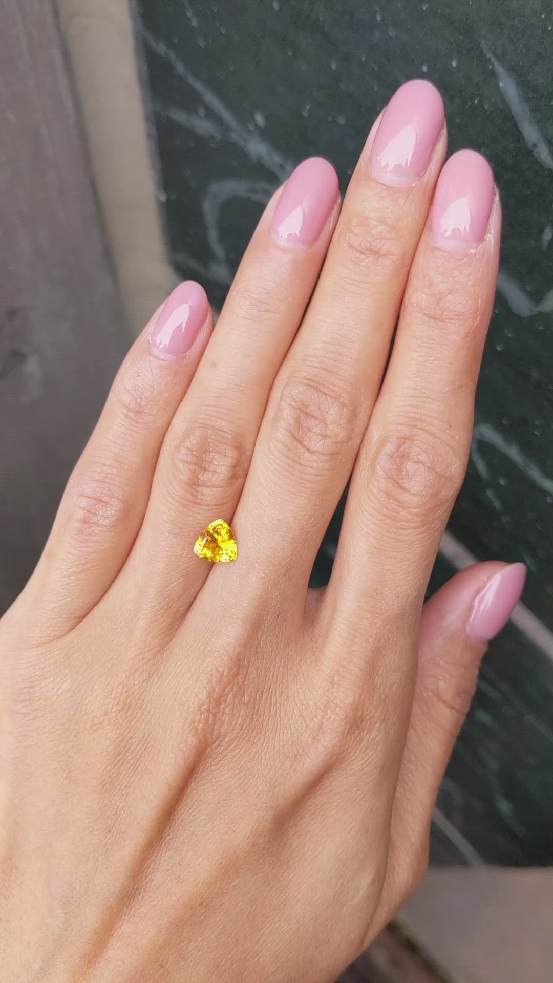 1.20 Ct. Yellowish Orange Sapphire from Ceylon (Sri Lanka) Size Video