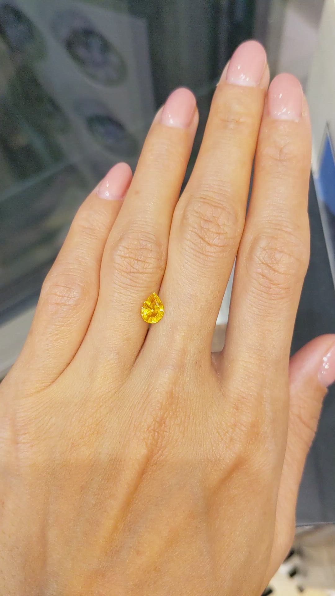 1.15 Ct. Yellowish Orange Sapphire from Ceylon (Sri Lanka) Size Video