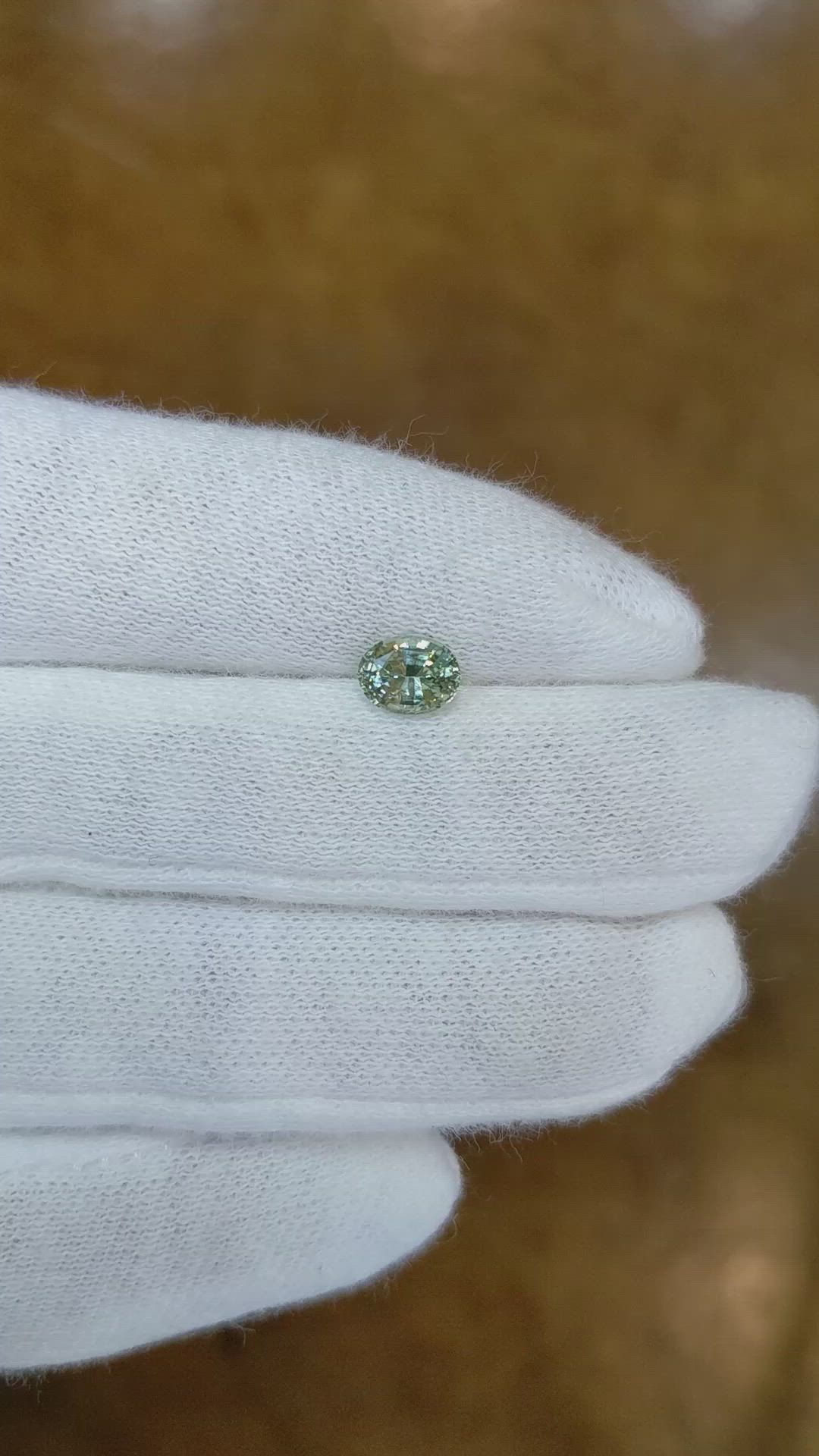 0.92 Ct. Yellowish Green Sapphire from Ceylon (Sri Lanka) Size Video