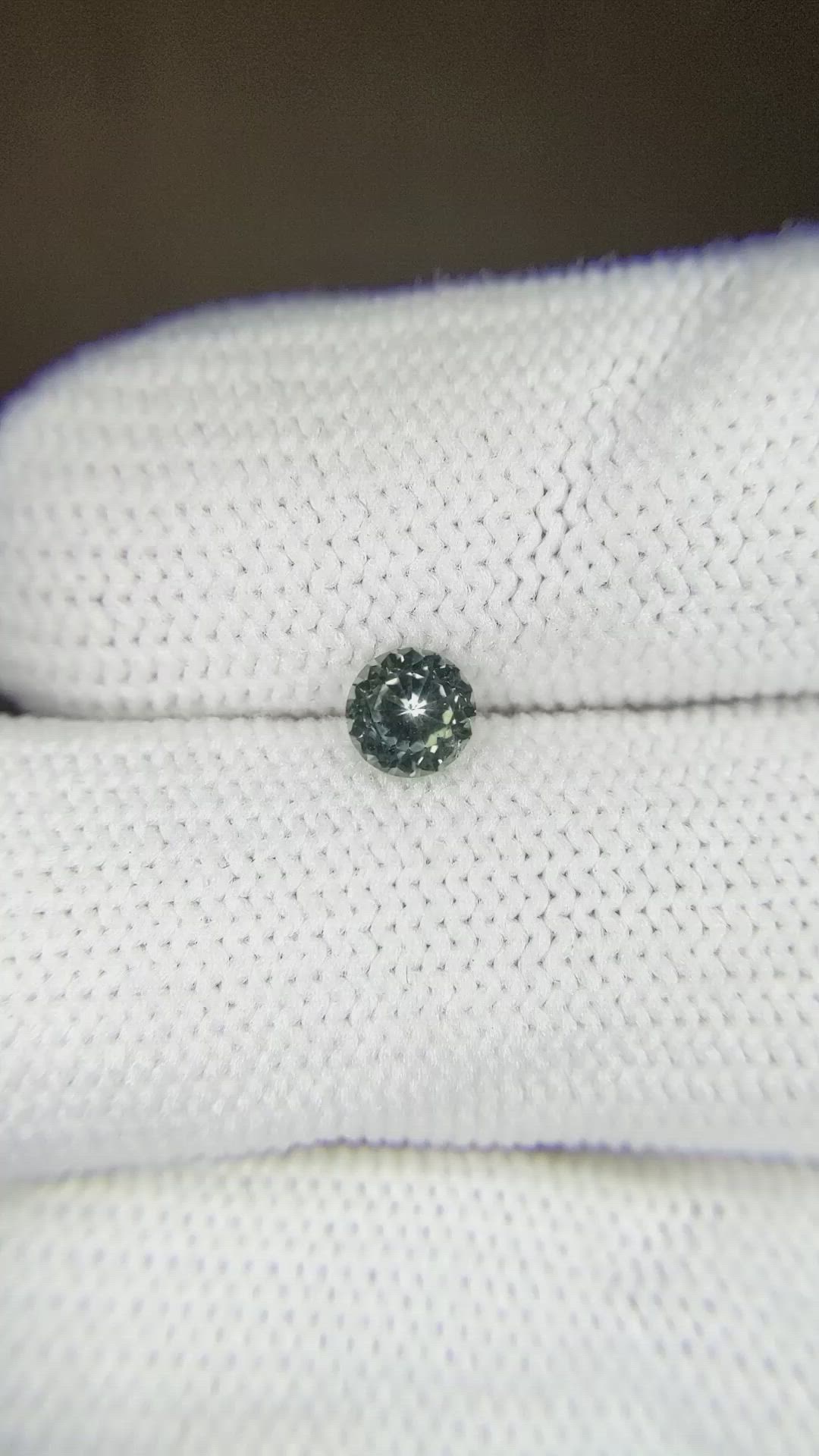 0.41 Ct. Bluish Green Sapphire from Montana Size Video