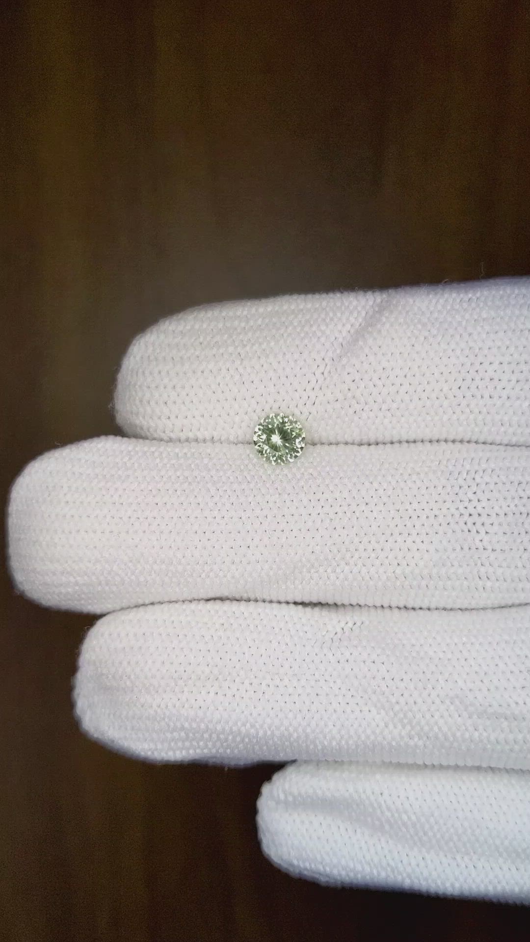 0.59 Ct. Yellowish Green Sapphire from Montana Size Video