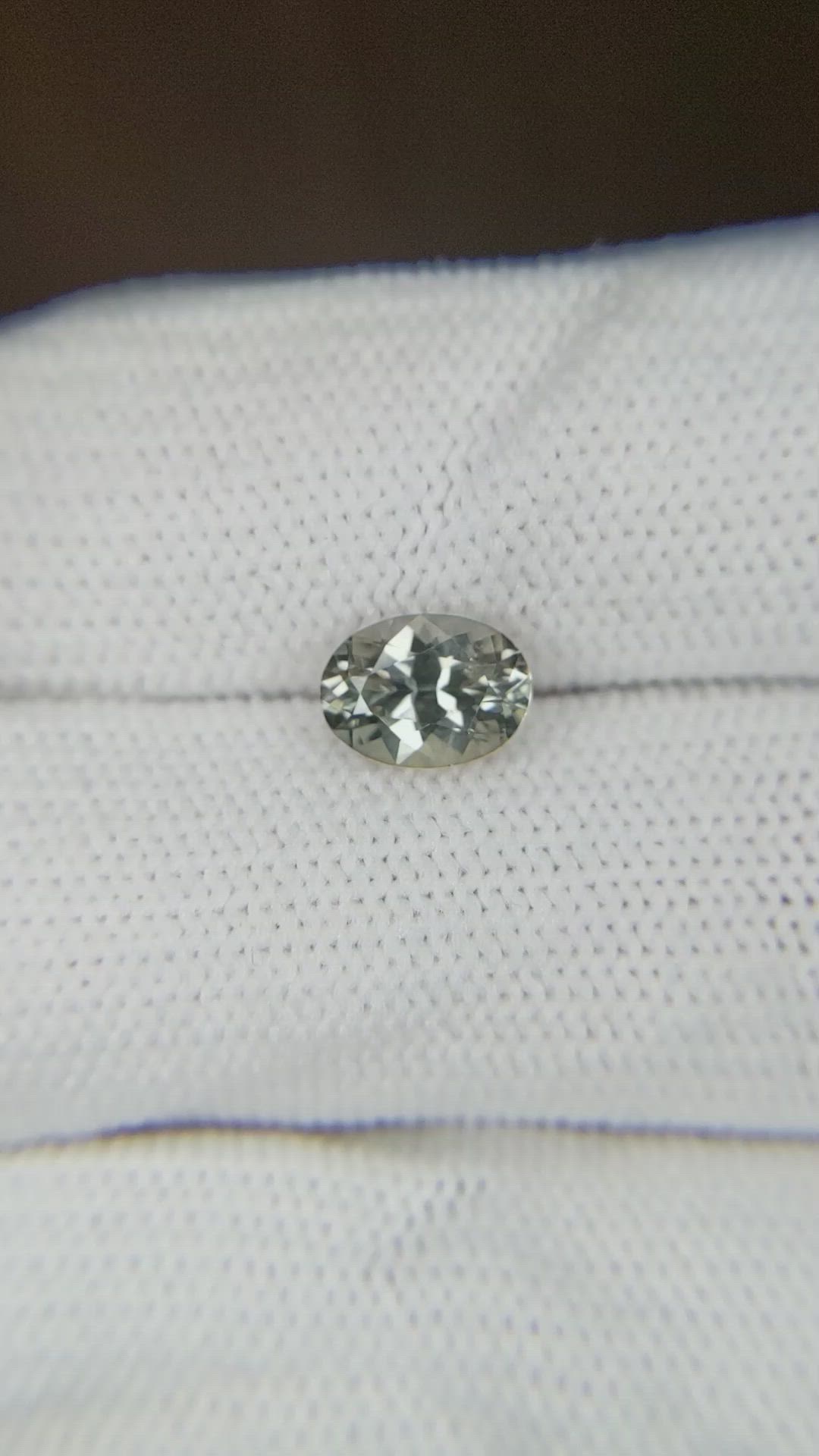 1.31 Ct. Greenish Brown Sapphire from Montana Size Video