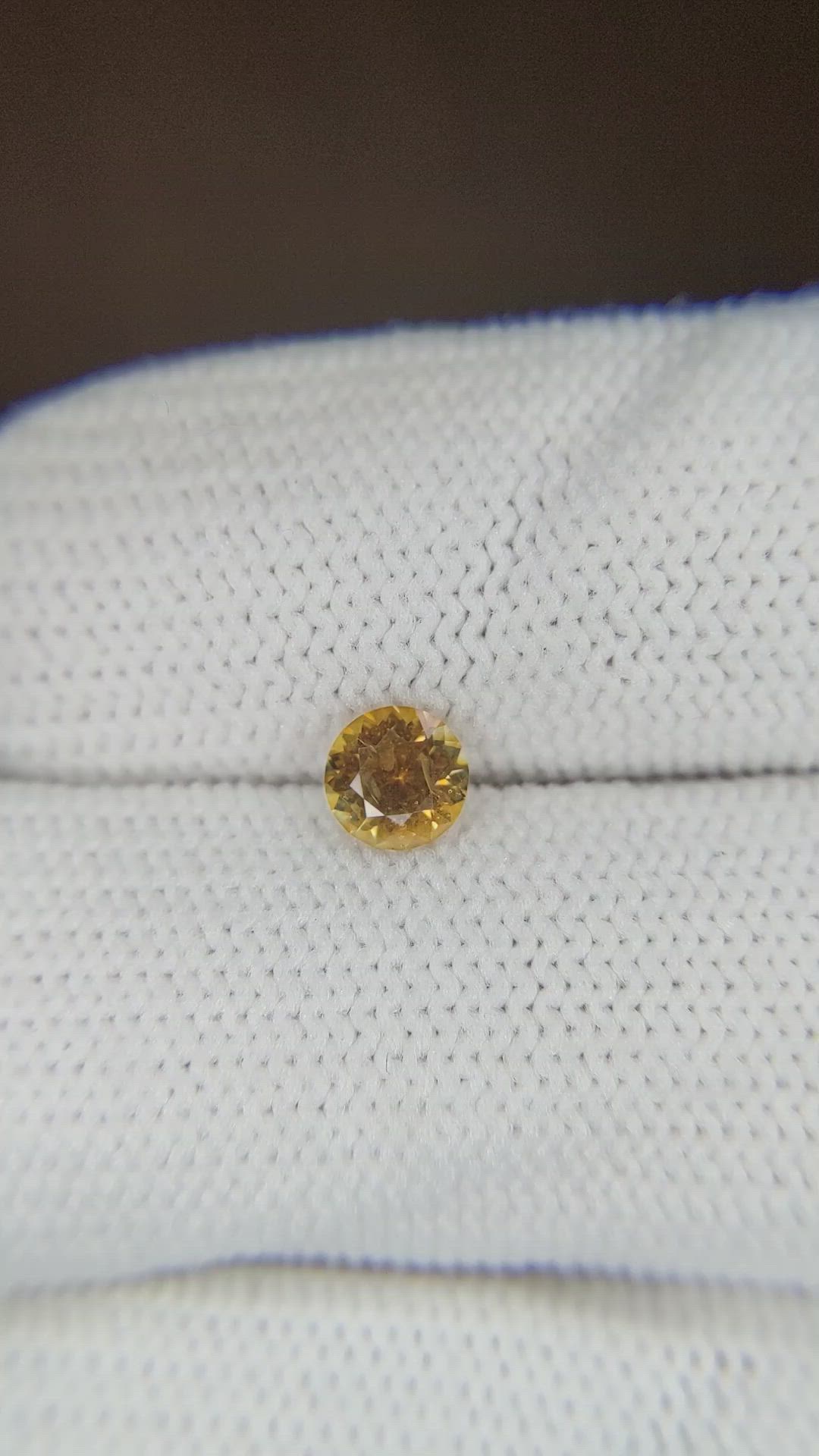 0.53 Ct. Yellowish Orange Sapphire from Montana Size Video