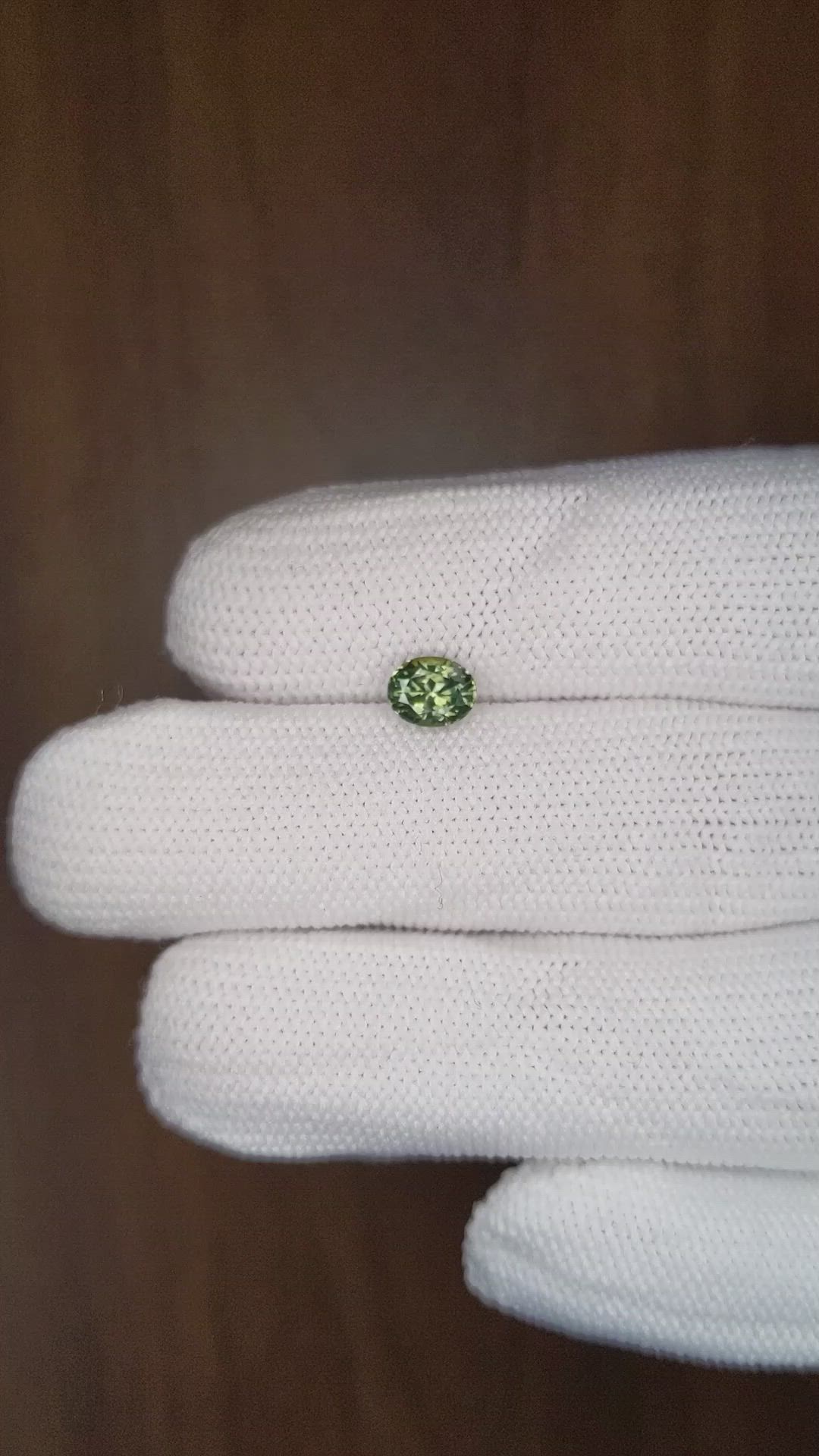 0.90 Ct. Yellowish Green Sapphire from Montana Size Video
