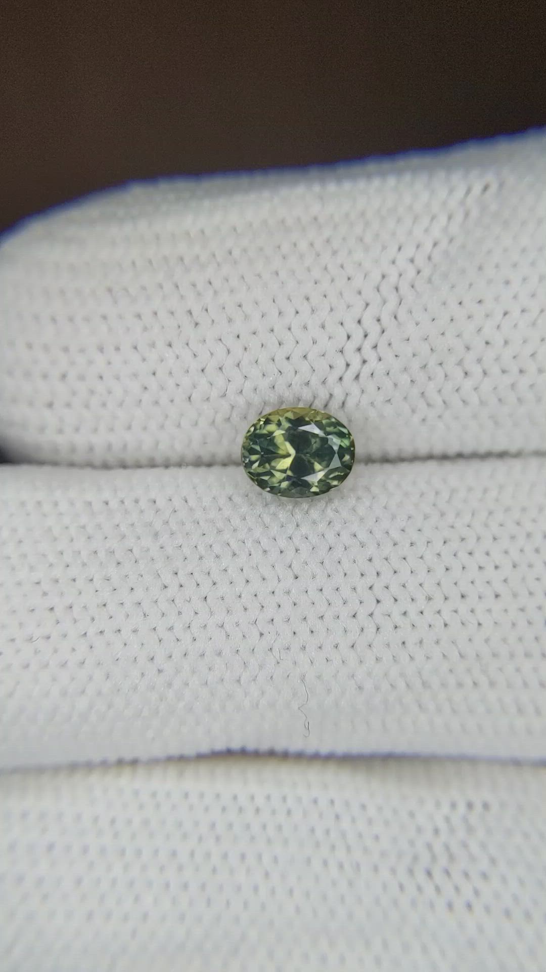 0.90 Ct. Yellowish Green Sapphire from Montana Size Video