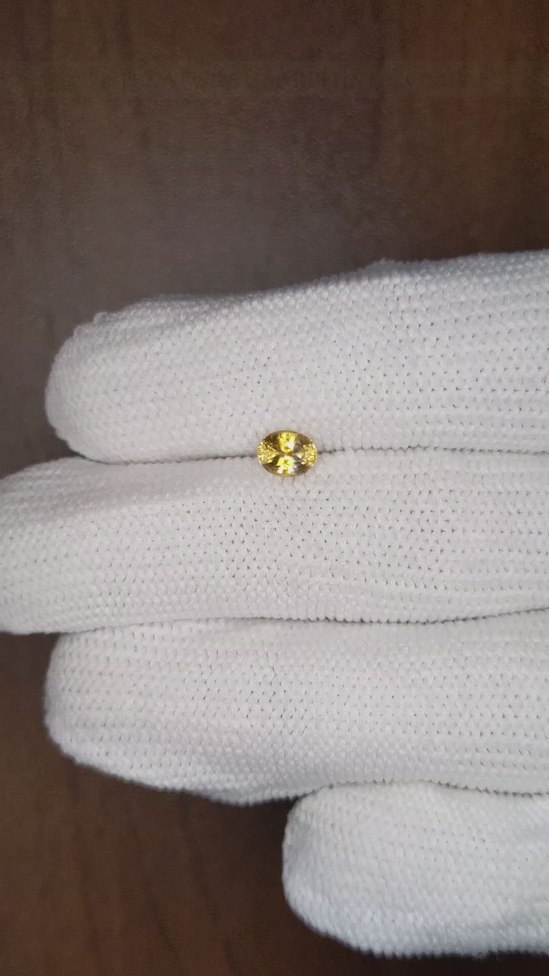 0.64 Ct. Orangish Brown Sapphire from Montana Size Video