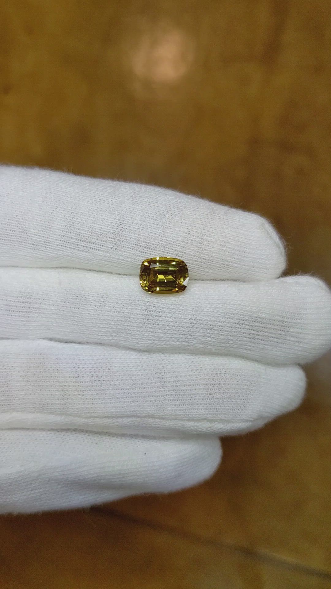 2.30 Ct. Yellowish Brown Sapphire from Ceylon (Sri Lanka) Size Video