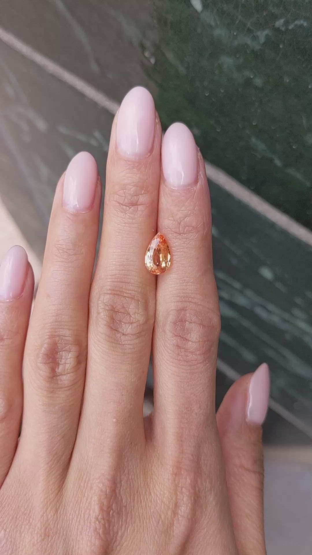 2.77 Ct. Peach Sapphire from Ceylon (Sri Lanka) Size Video