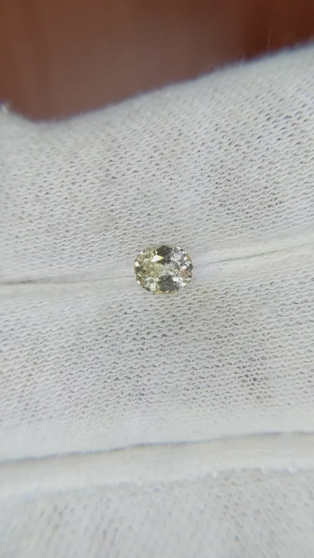 0.65 Ct. Peach Sapphire from Ceylon (Sri Lanka) Size Video