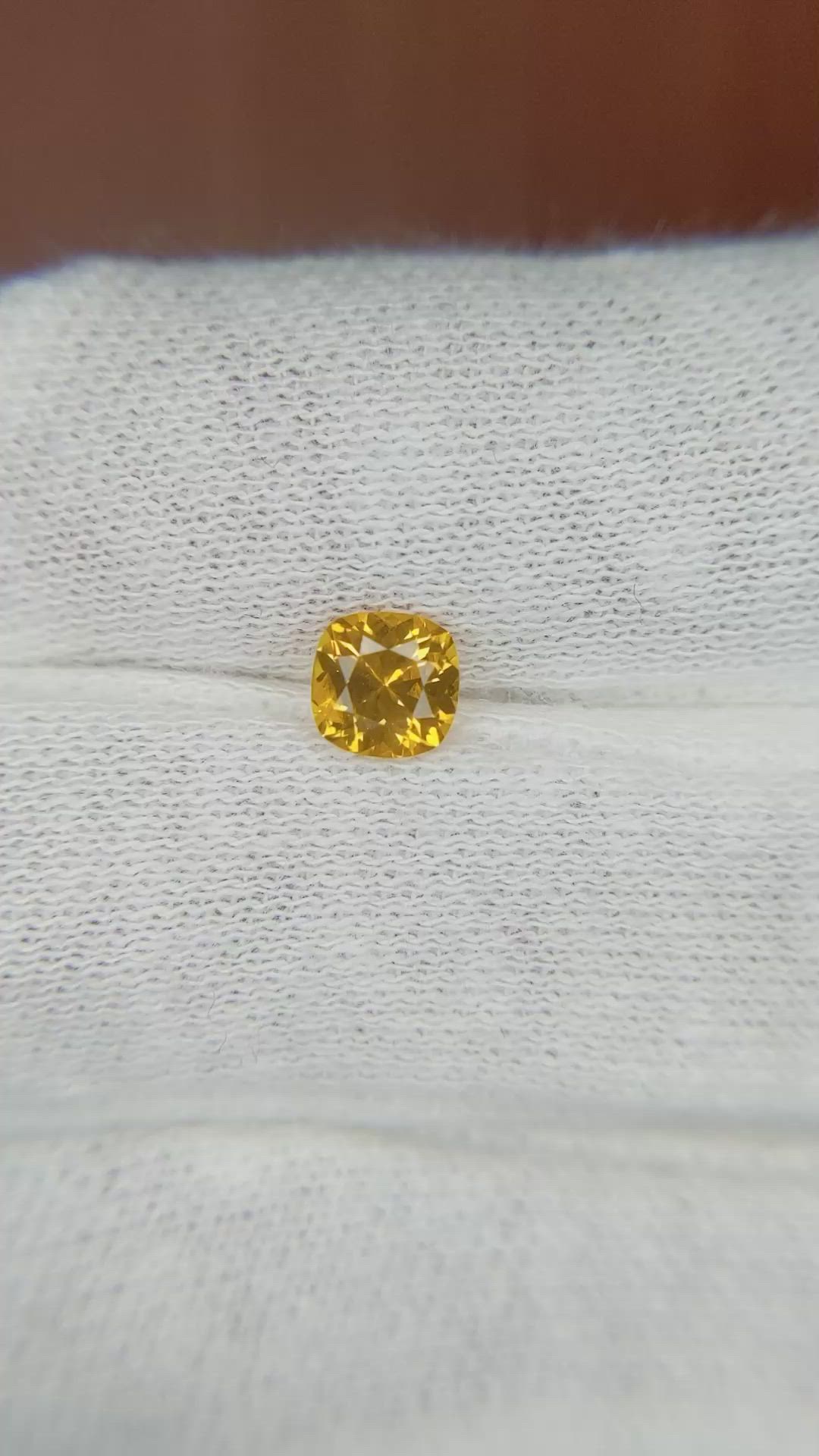 0.68 Ct. Yellowish Orange Sapphire from Ceylon (Sri Lanka) Size Video
