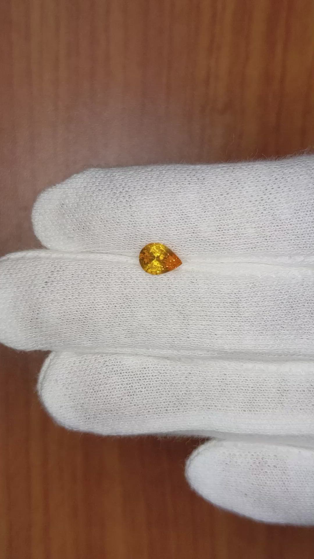 0.74 Ct. Orange Sapphire from Ceylon (Sri Lanka) Size Video