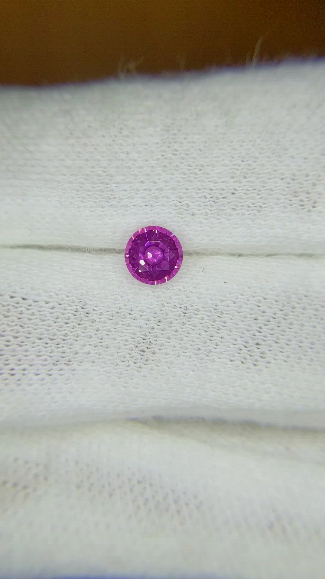 0.61 Ct. Purplish Pink Sapphire from Ceylon (Sri Lanka) Size Video