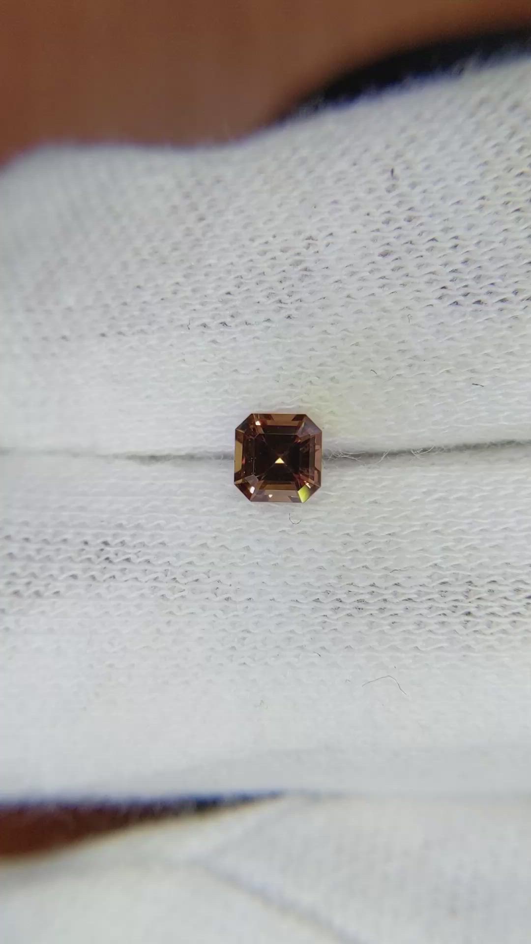 0.38 Ct. Orangish Brown Sapphire from Ceylon (Sri Lanka) Size Video