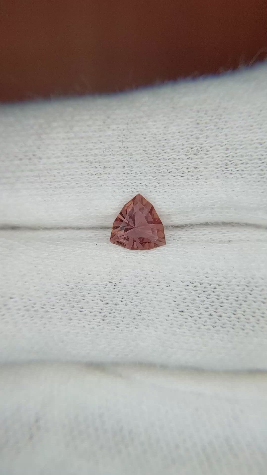 0.70 Ct. Reddish Pink Sapphire from Ceylon (Sri Lanka) Size Video
