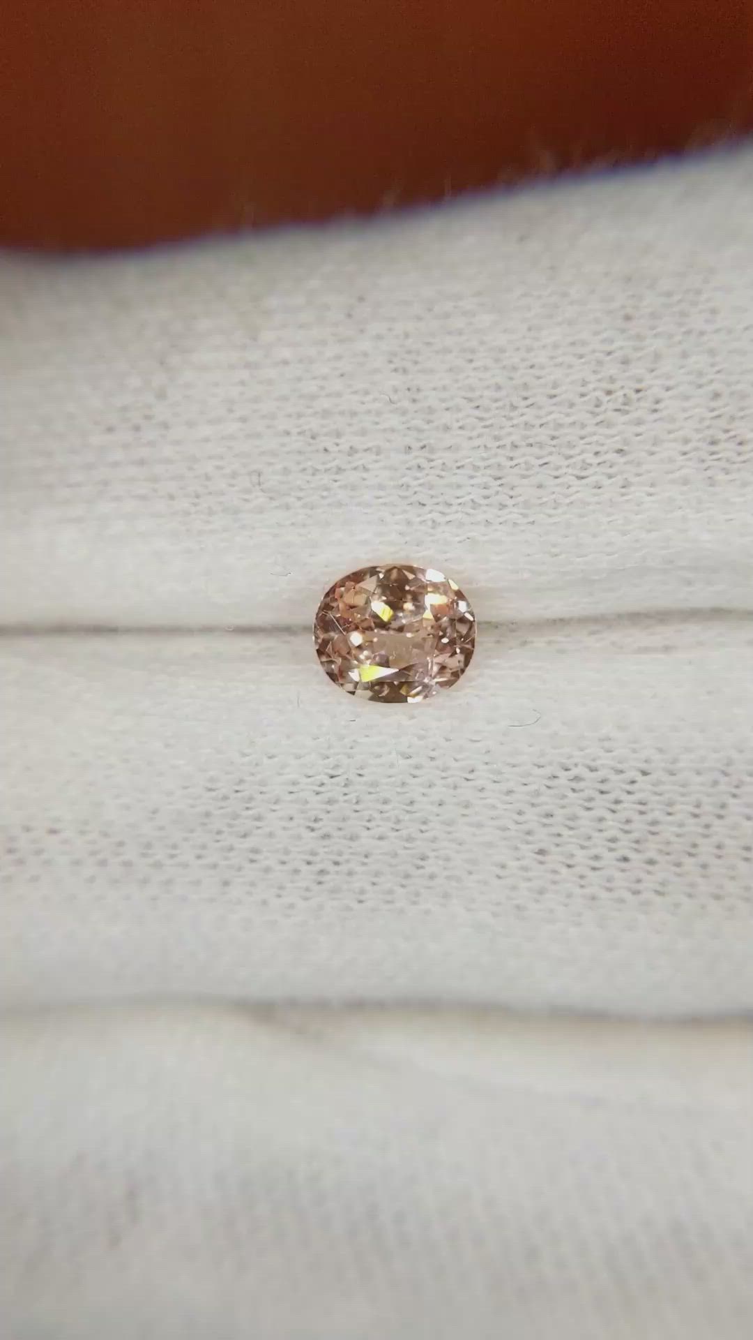 0.76 Ct. Peach Sapphire from Ceylon (Sri Lanka) Size Video