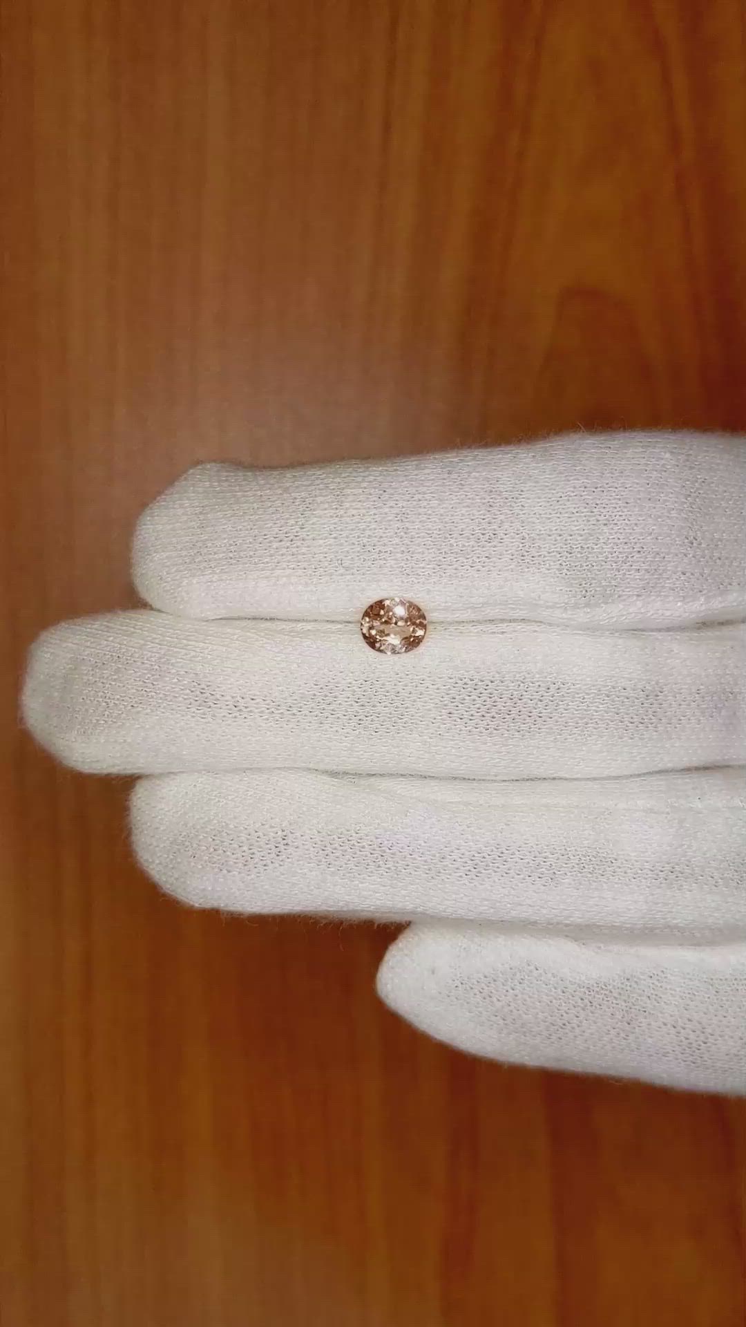 0.76 Ct. Peach Sapphire from Ceylon (Sri Lanka) Size Video