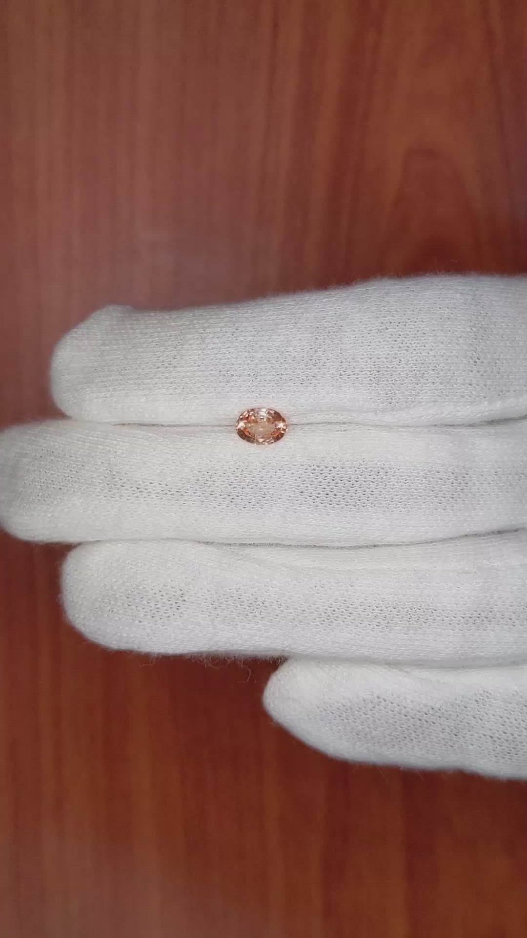 0.76 Ct. Peach Sapphire from Ceylon (Sri Lanka) Size Video