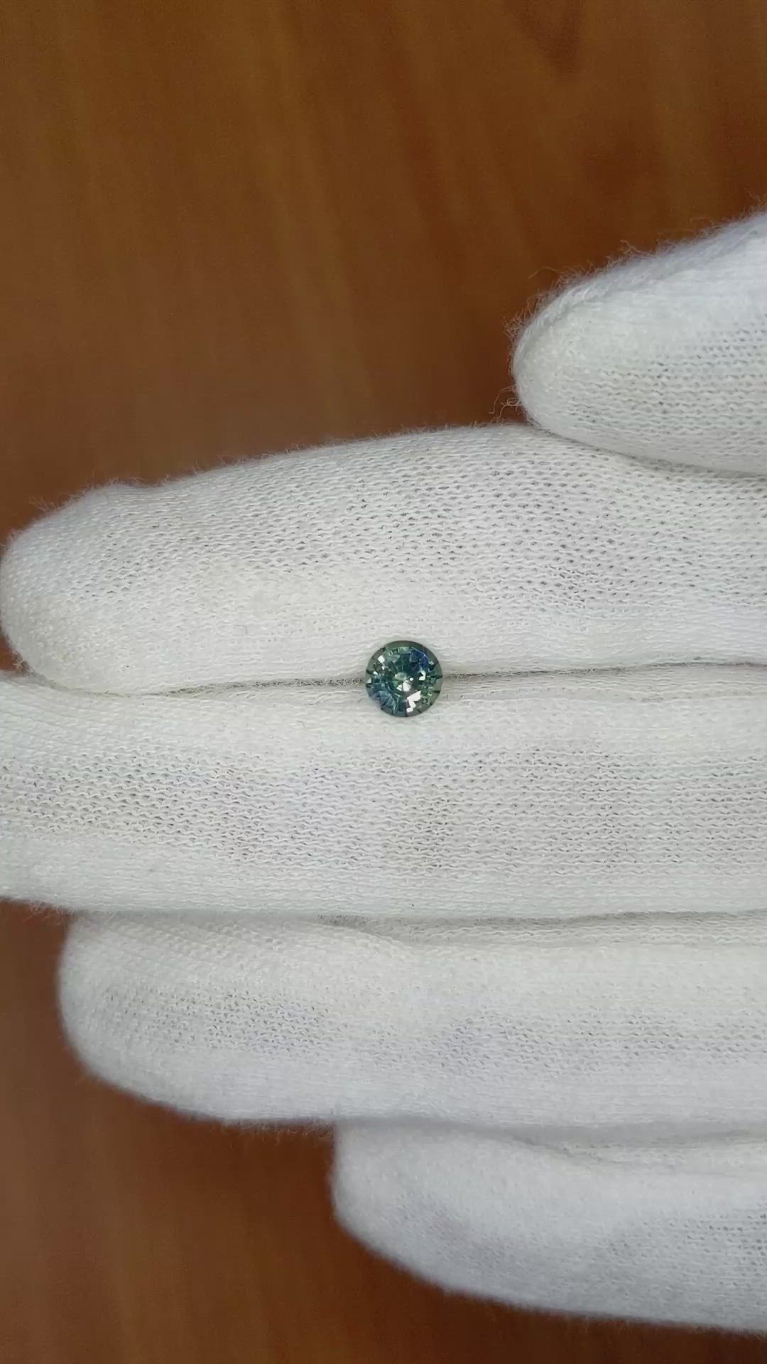 0.61 Ct. Bluish Green Sapphire from Ceylon (Sri Lanka) Size Video