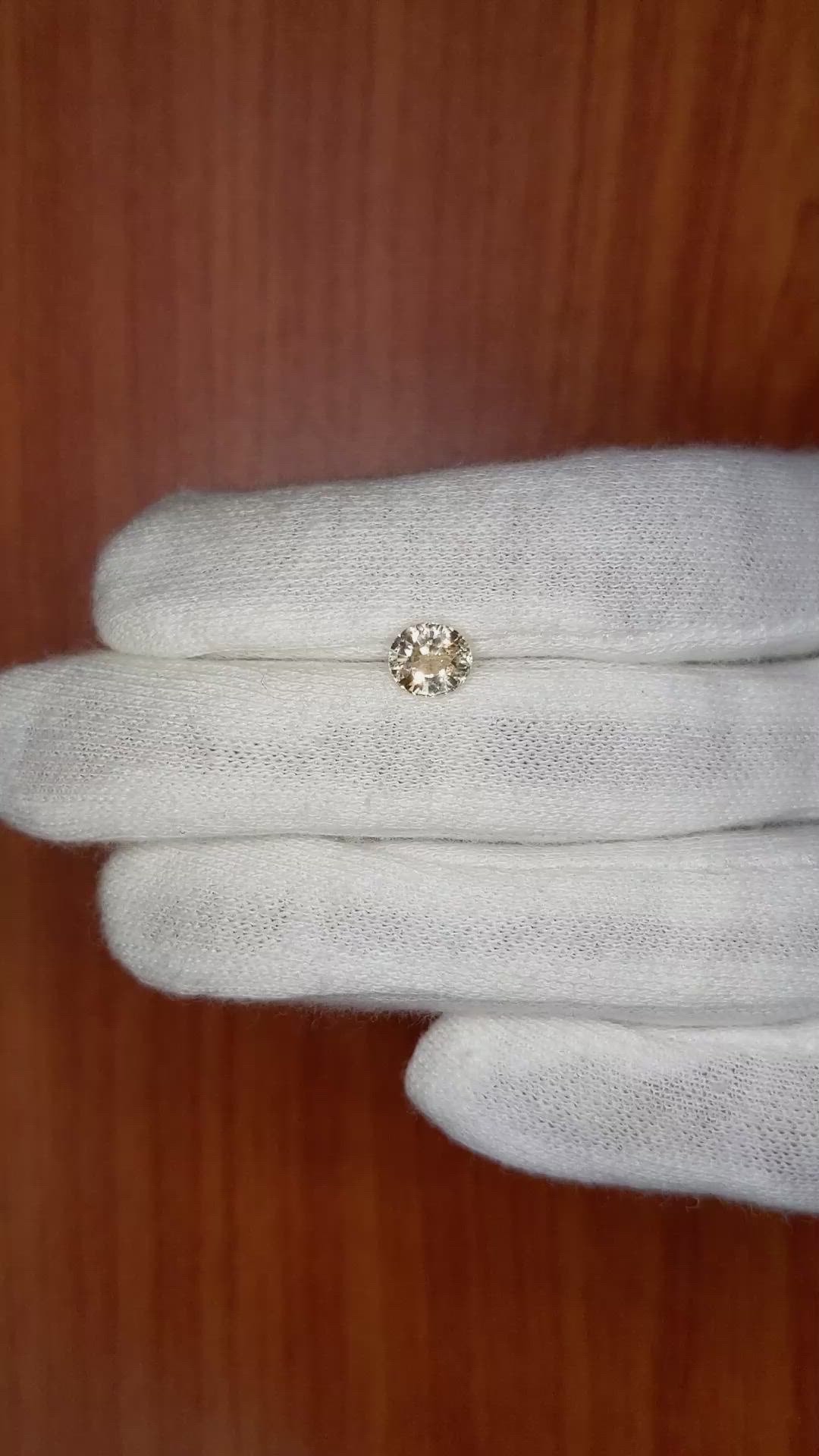 1.40 Ct. Peach Sapphire from Ceylon (Sri Lanka) Size Video