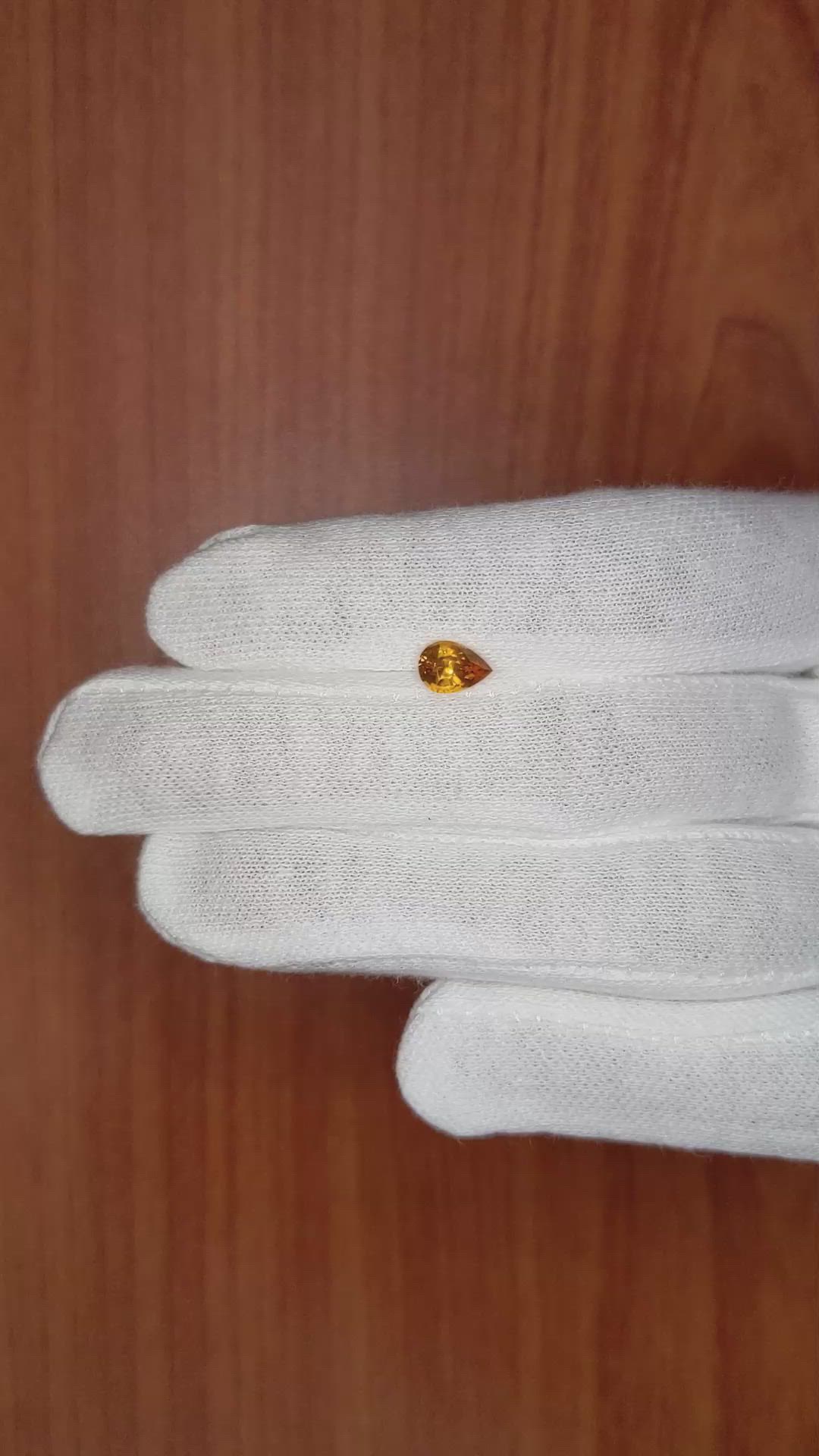 0.88 Ct. Orange Sapphire from Ceylon (Sri Lanka) Size Video