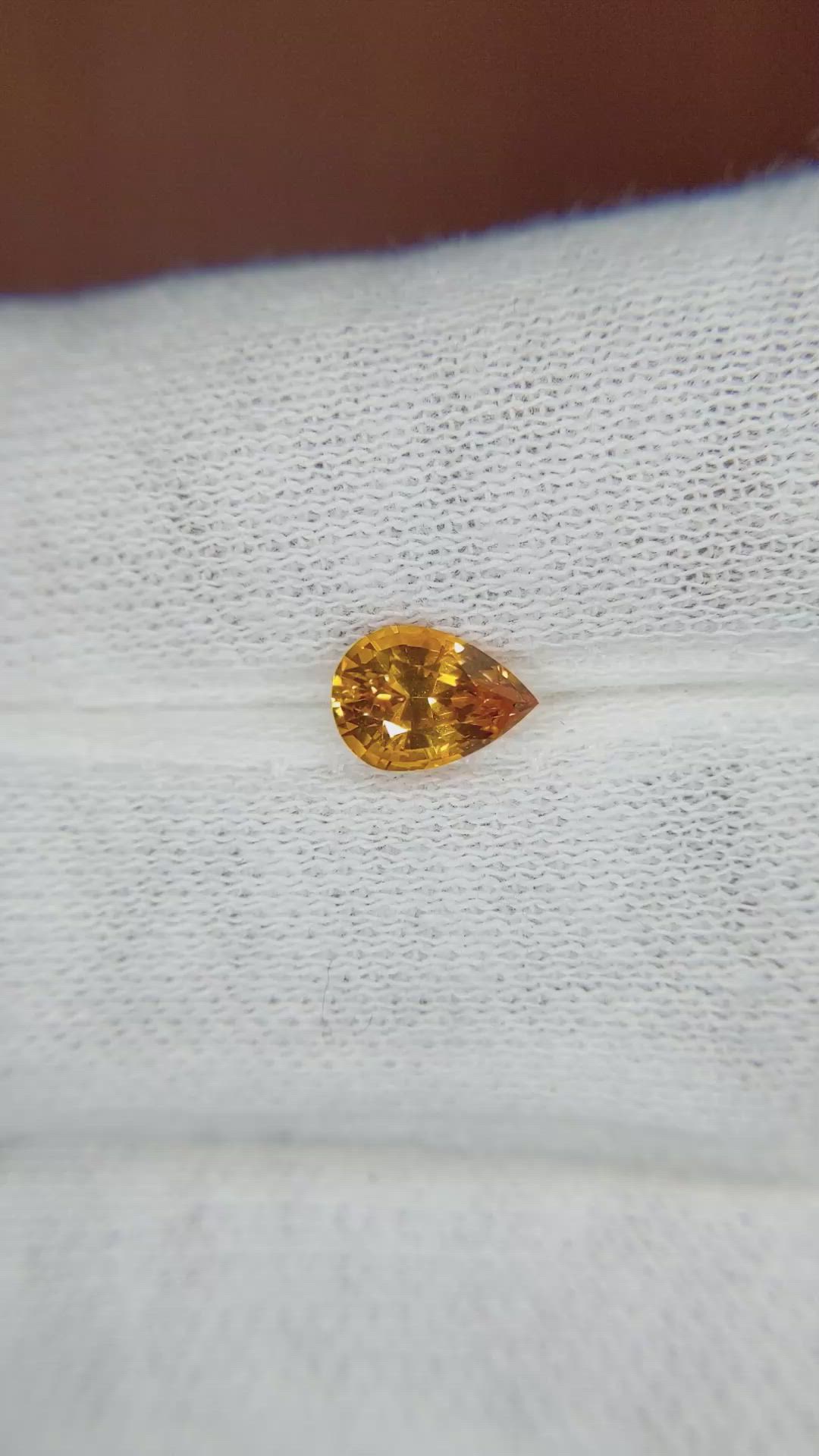 0.88 Ct. Orange Sapphire from Ceylon (Sri Lanka) Size Video