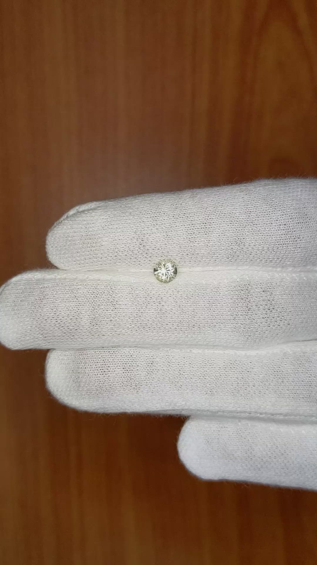 0.43 Ct. Peach Sapphire from Ceylon (Sri Lanka) Size Video