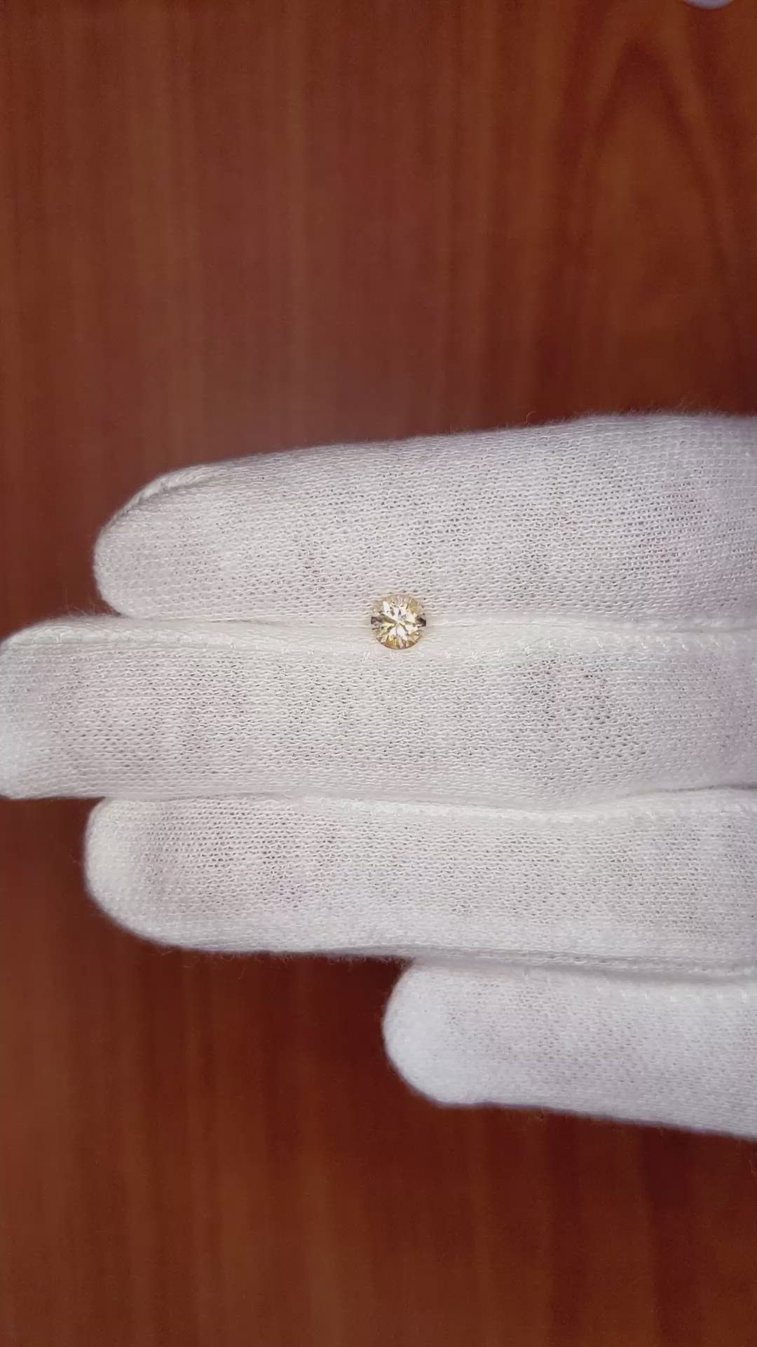 0.44 Ct. Peach Sapphire from Ceylon (Sri Lanka) Size Video