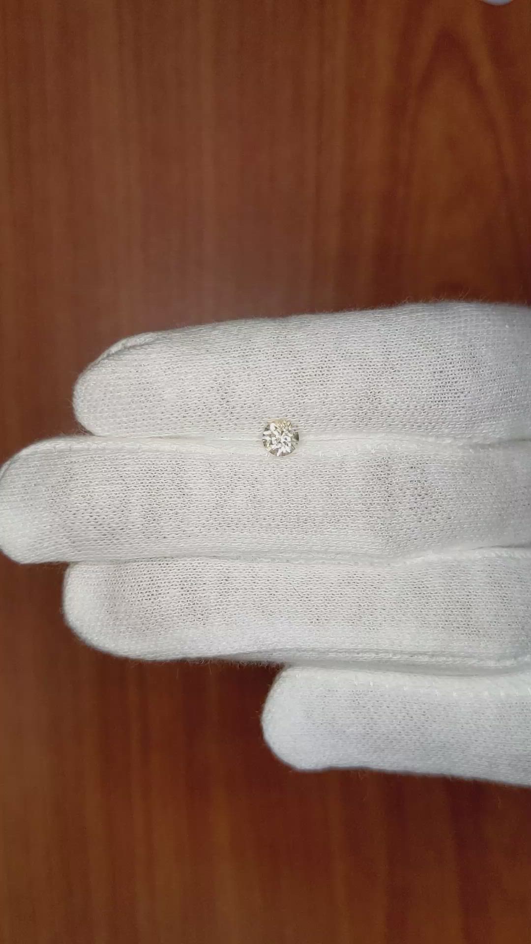 0.46 Ct. Peach Sapphire from Ceylon (Sri Lanka) Size Video